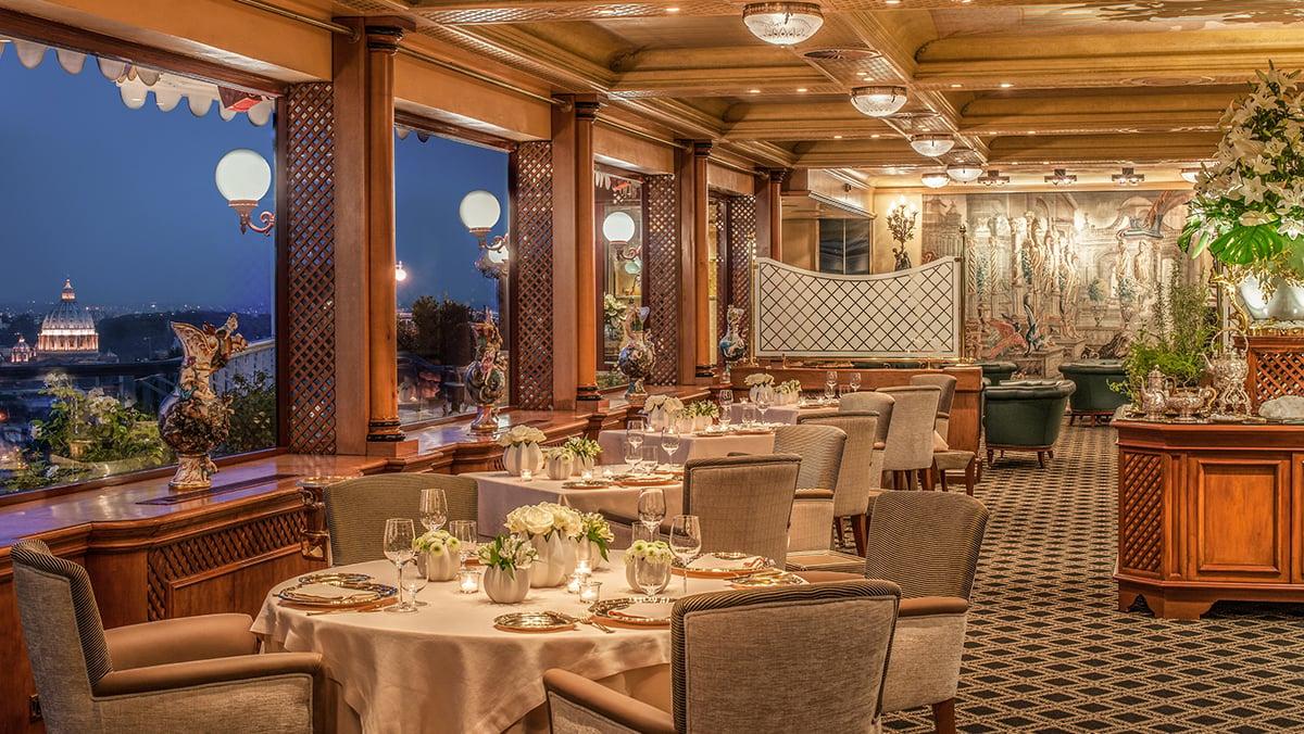 Luxurious dining room at the Rome Cavalieri, A Waldorf Astoria Hotel