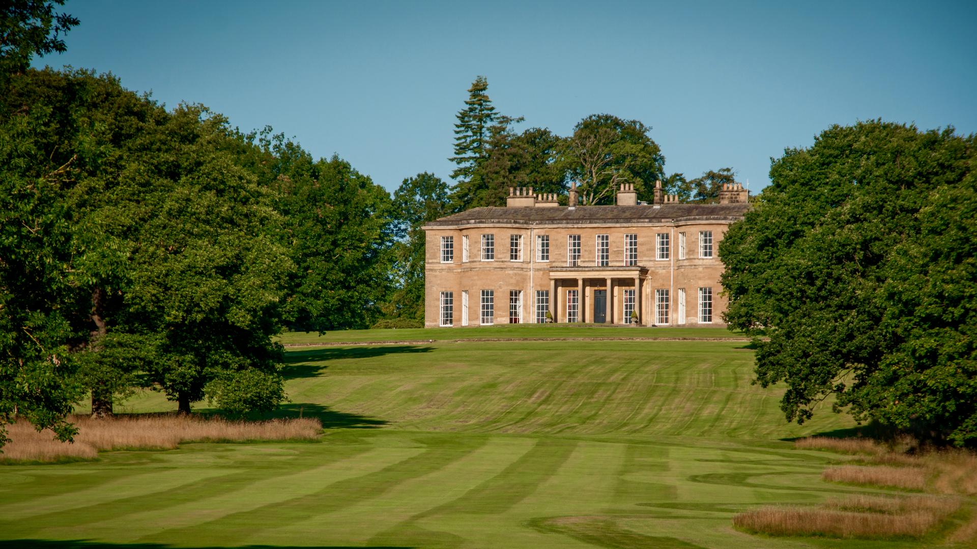 Panoramic view of the Rudding Park Hotel & Golf Clubhouse overlooking the course