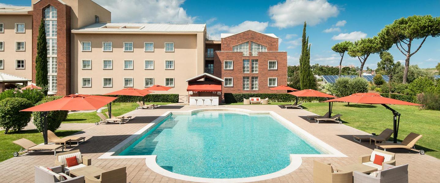 Outdoor swimming pool at Sheraton Golf Parco De’ Medici Hotel & Resort
