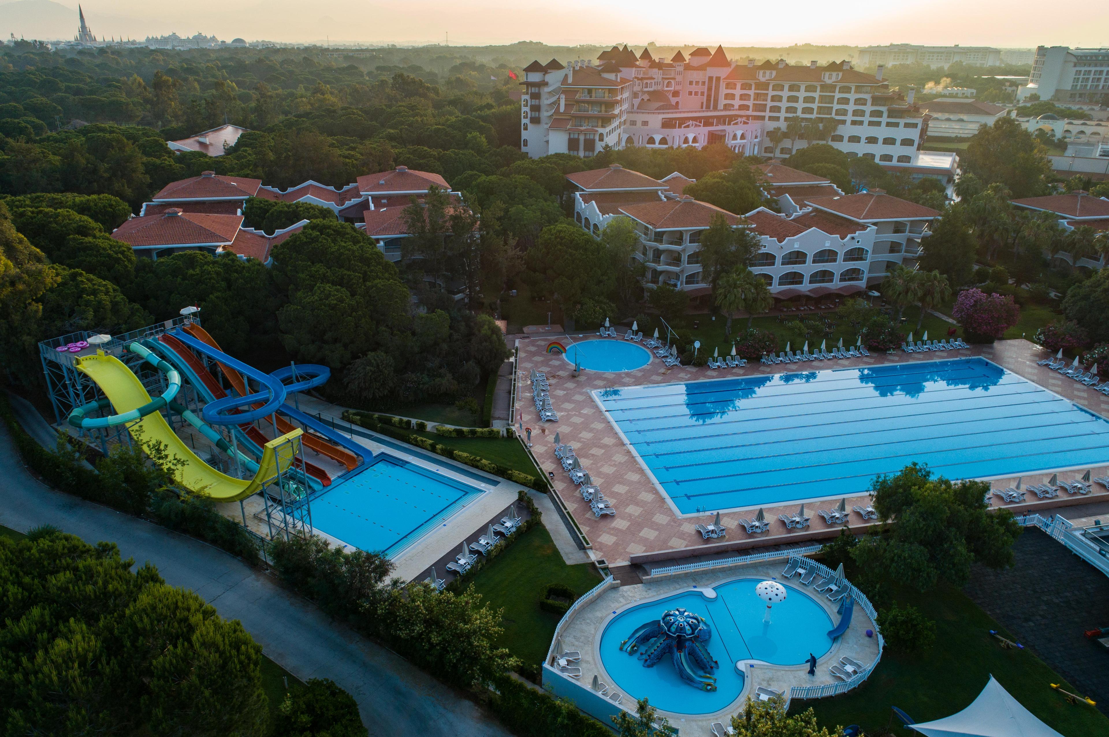 Overhead view of the outdoor swimming pools at Sirene Belek Golf & Wellness Hotel