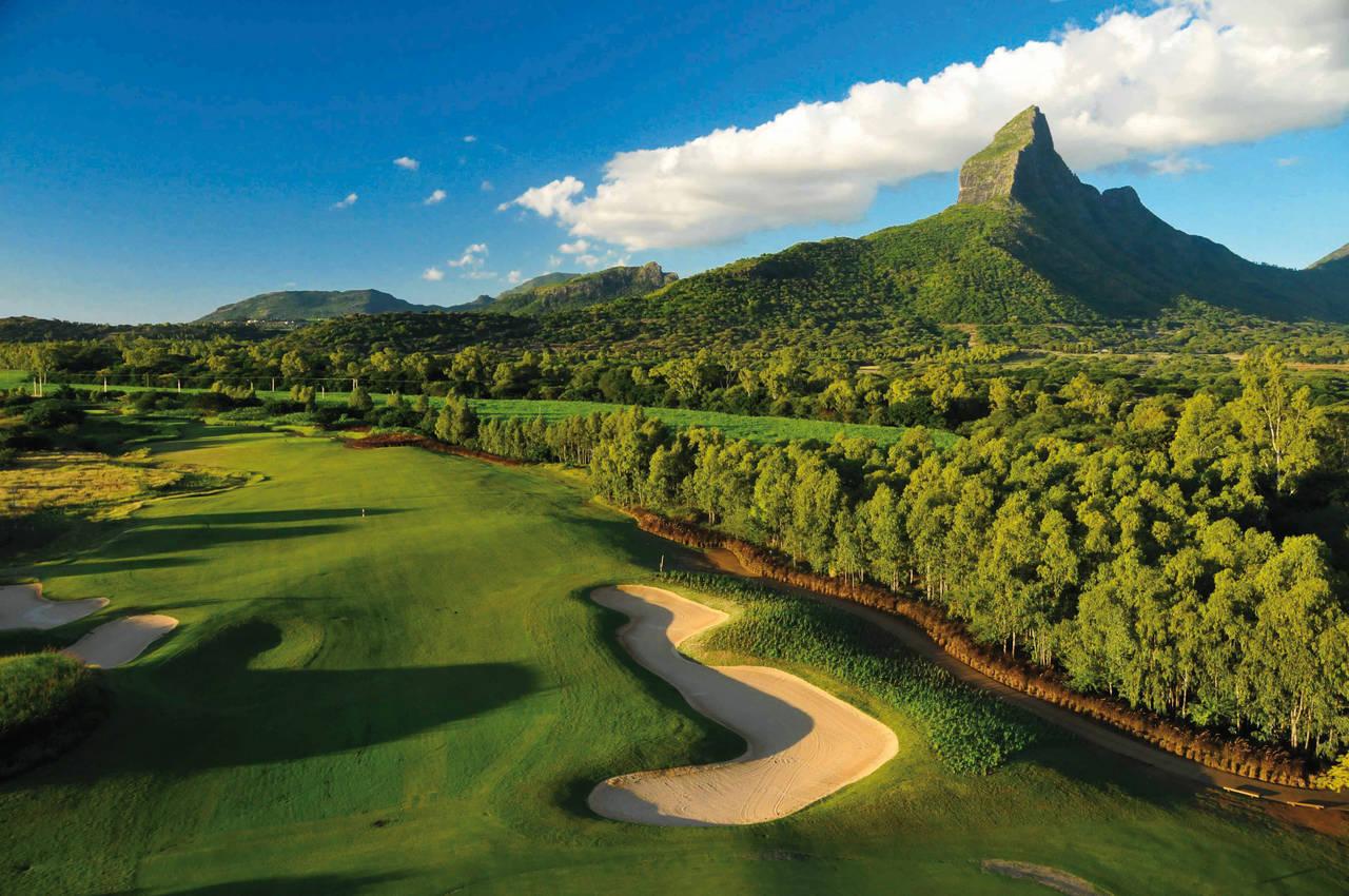 A well maintained fairway with distant mountain views