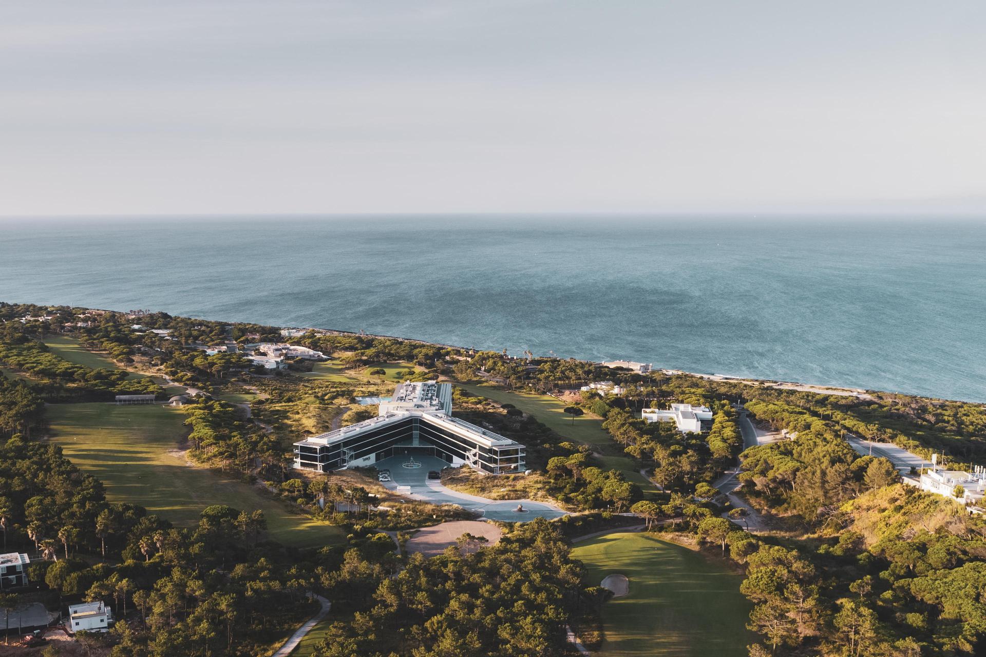 Aerial view of The Oitavos surrounded by its golf course
