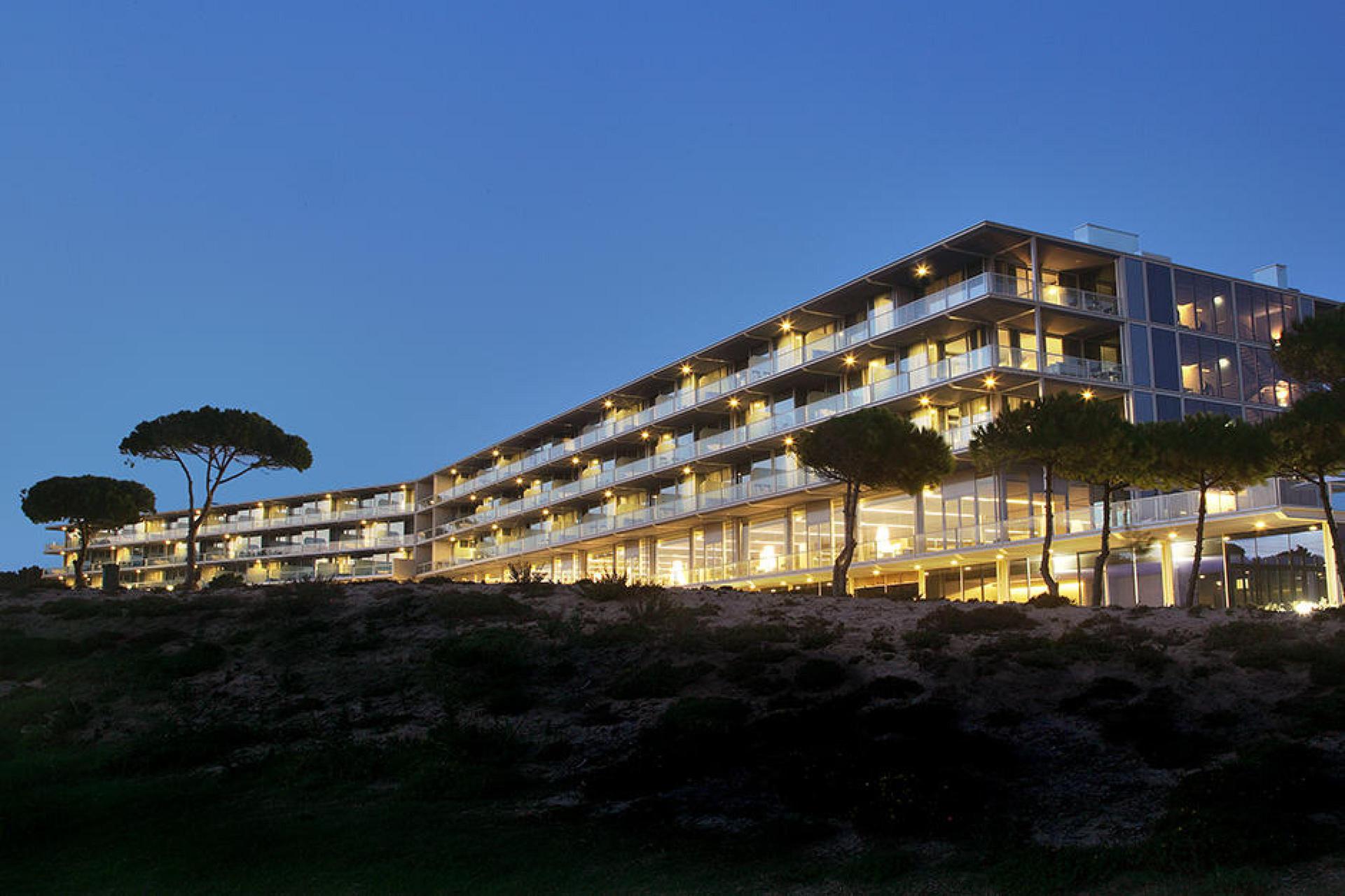 Panoramic view of The Oitavos lit up at evening