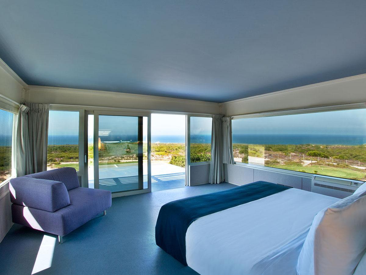 Double bed room as part of a suite with balcony views