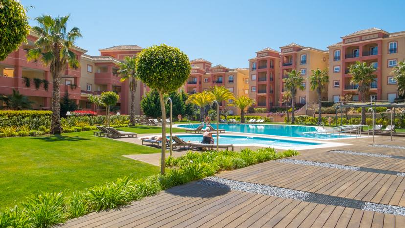 Outdoor swimming pool at The Residences Islantilla Resort