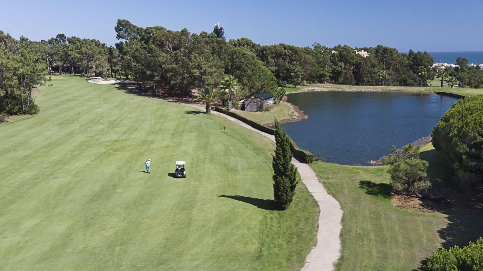Aerial view of a well maintained fairway at The Residences Islantilla Resort