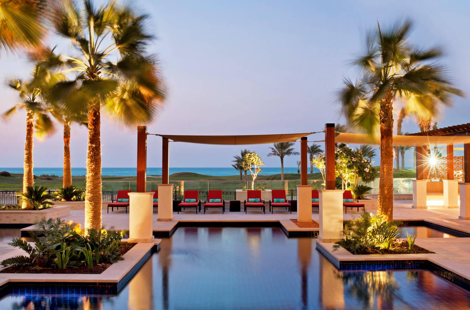 Outdoor swimming pool at The St Regis Saadiyat Island Resort
