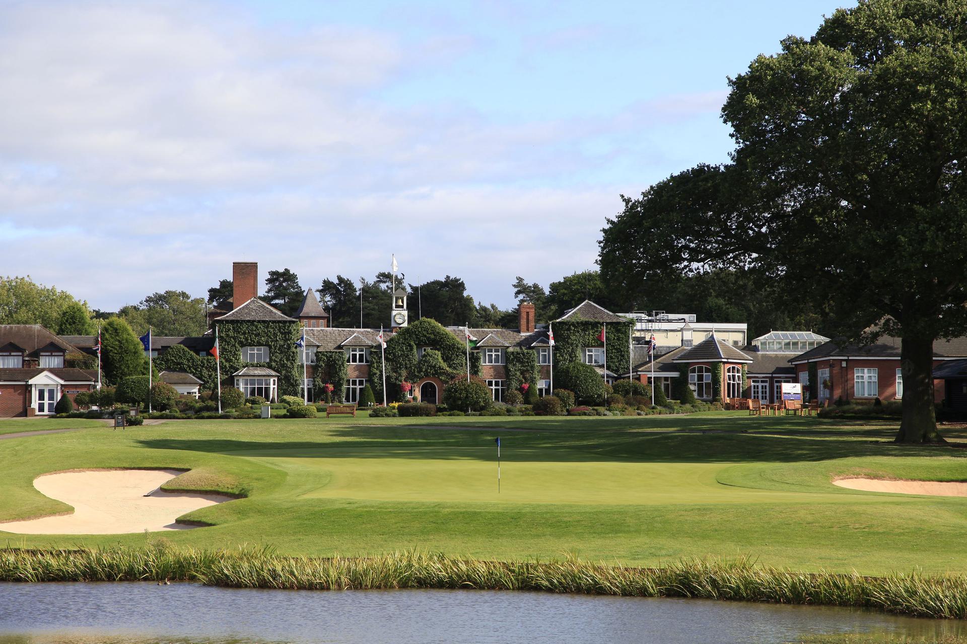 A well maintained fairway with sand bunkers