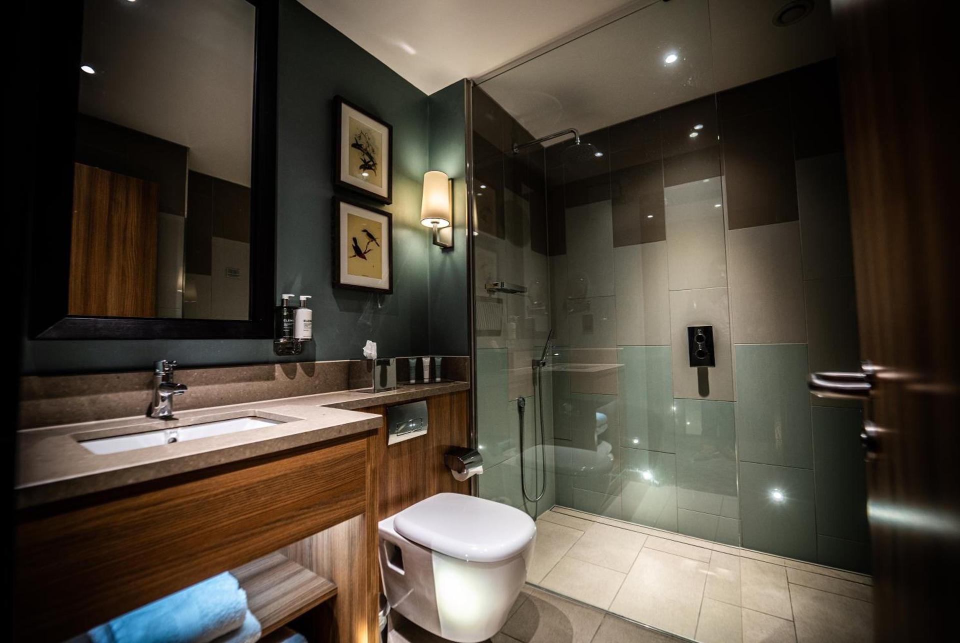 Modern luxury bathroom as part of a suite at the The Warwickshire Golf & Country Club