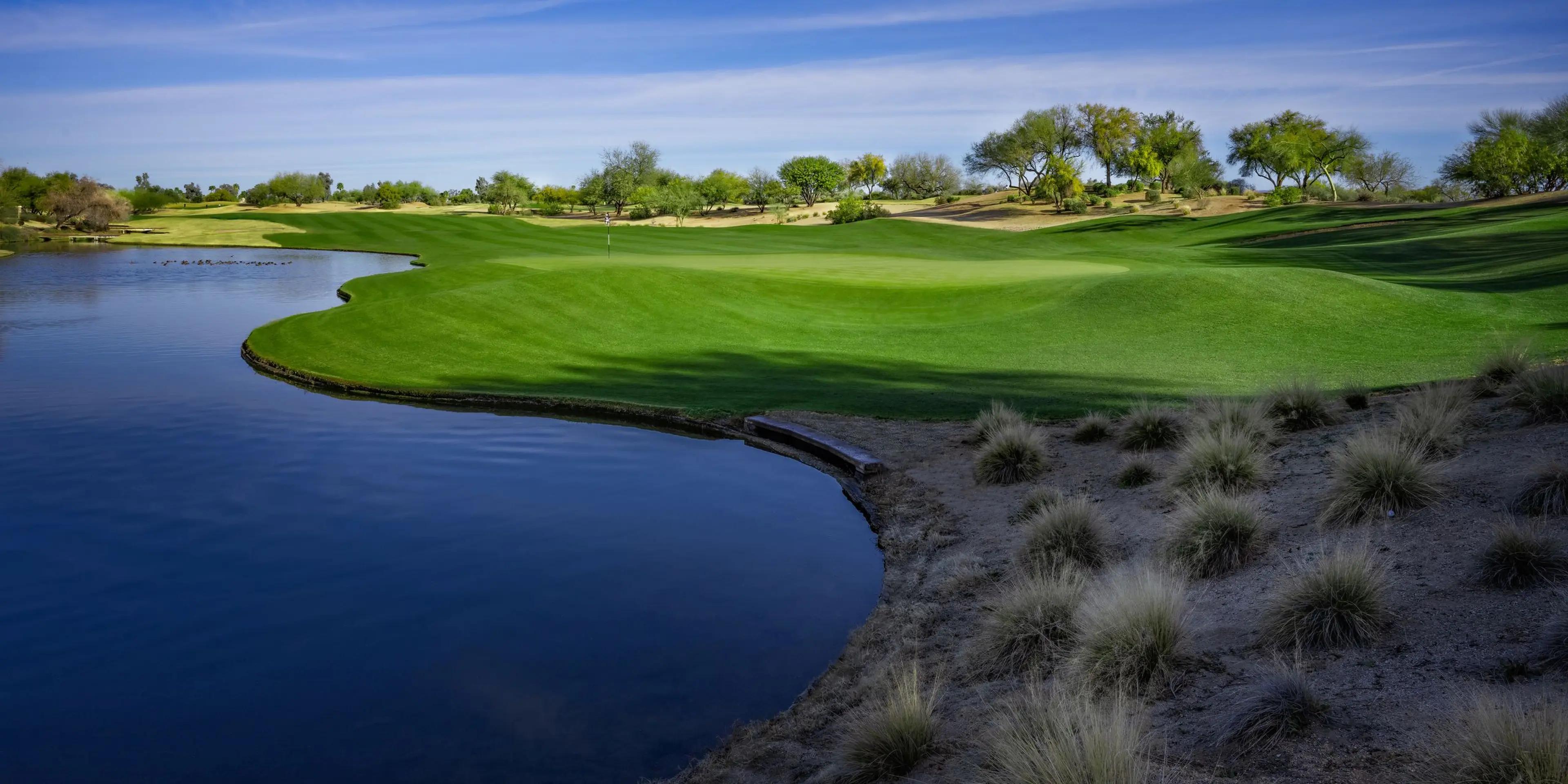 A well maintained fairway next to a water hazard at The Westin Kierland Resort and Spa