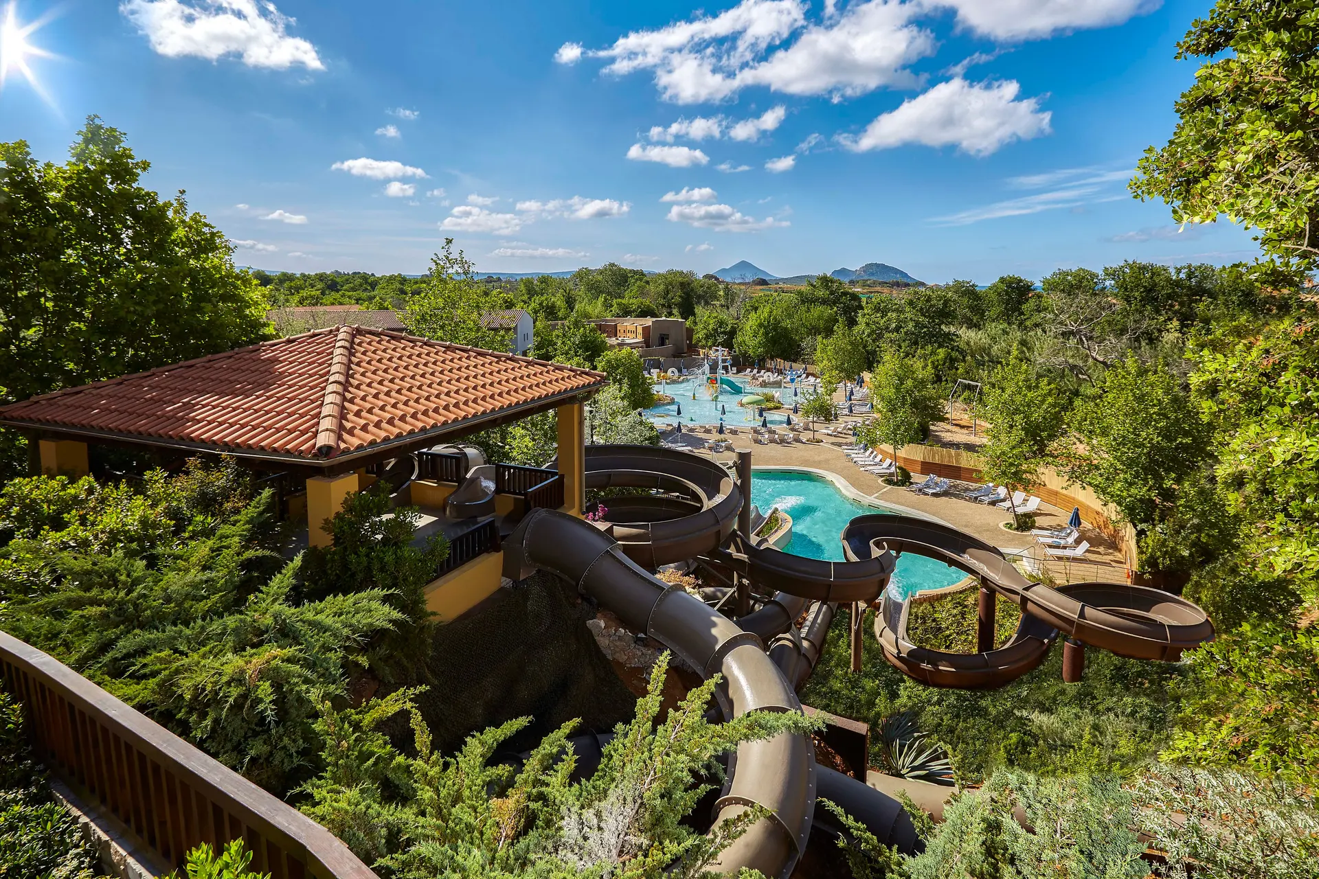 Overhead view of the outdoor swimming pool with water slides at The Westin Resort Costa Navarino