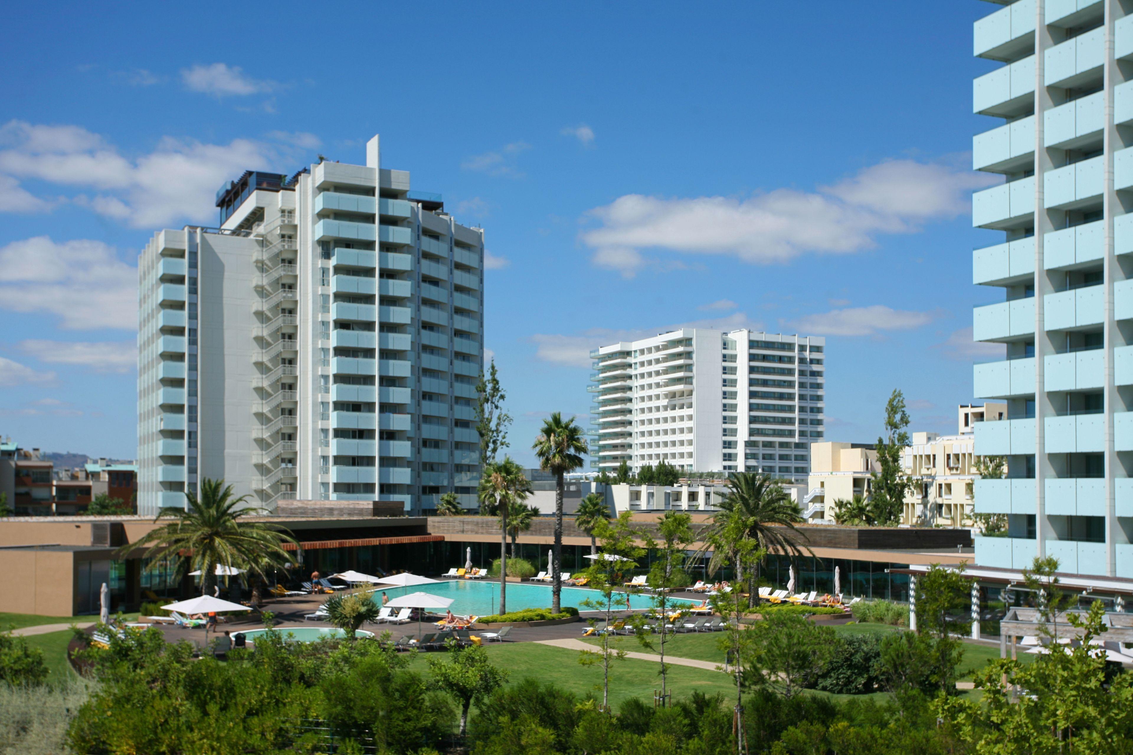 Panoramic view of the outdoor swimming pool at Troia Resort - Aqualuz Suite Hotel Apartments
