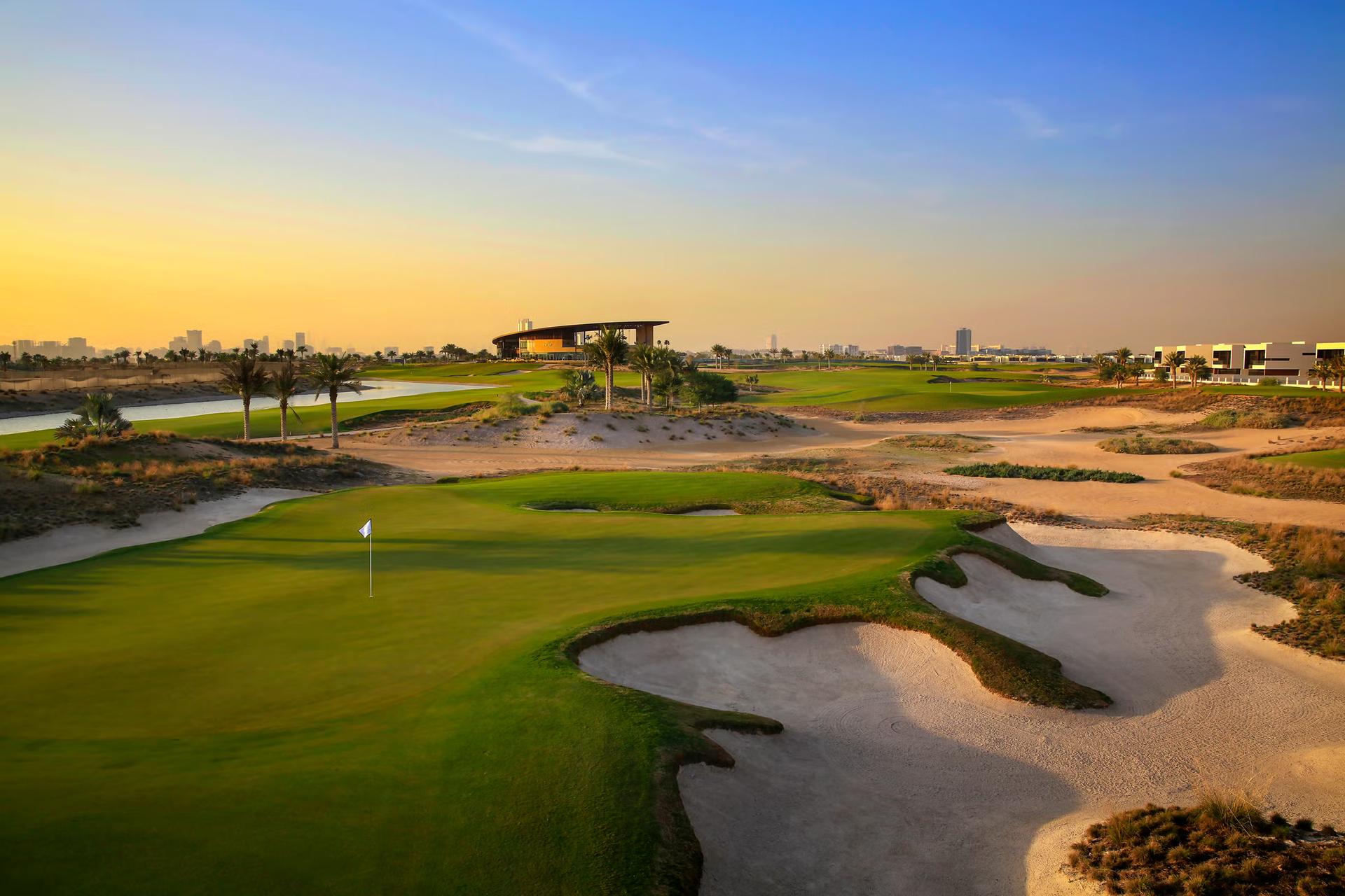 Panoramic view of a manicured green next to a sand bunker