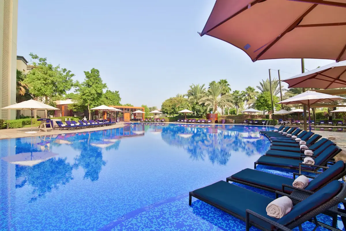 Outdoor swimming pool at VOGO Abu Dhabi Golf Resort & Spa