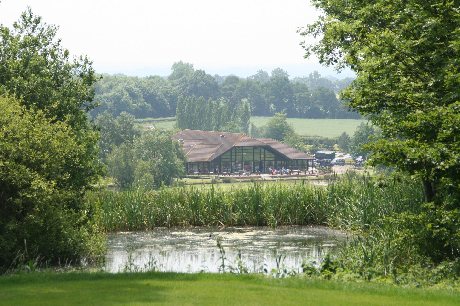 The Weald of Kent Golf Course & Hotel in the distance over the water hazard