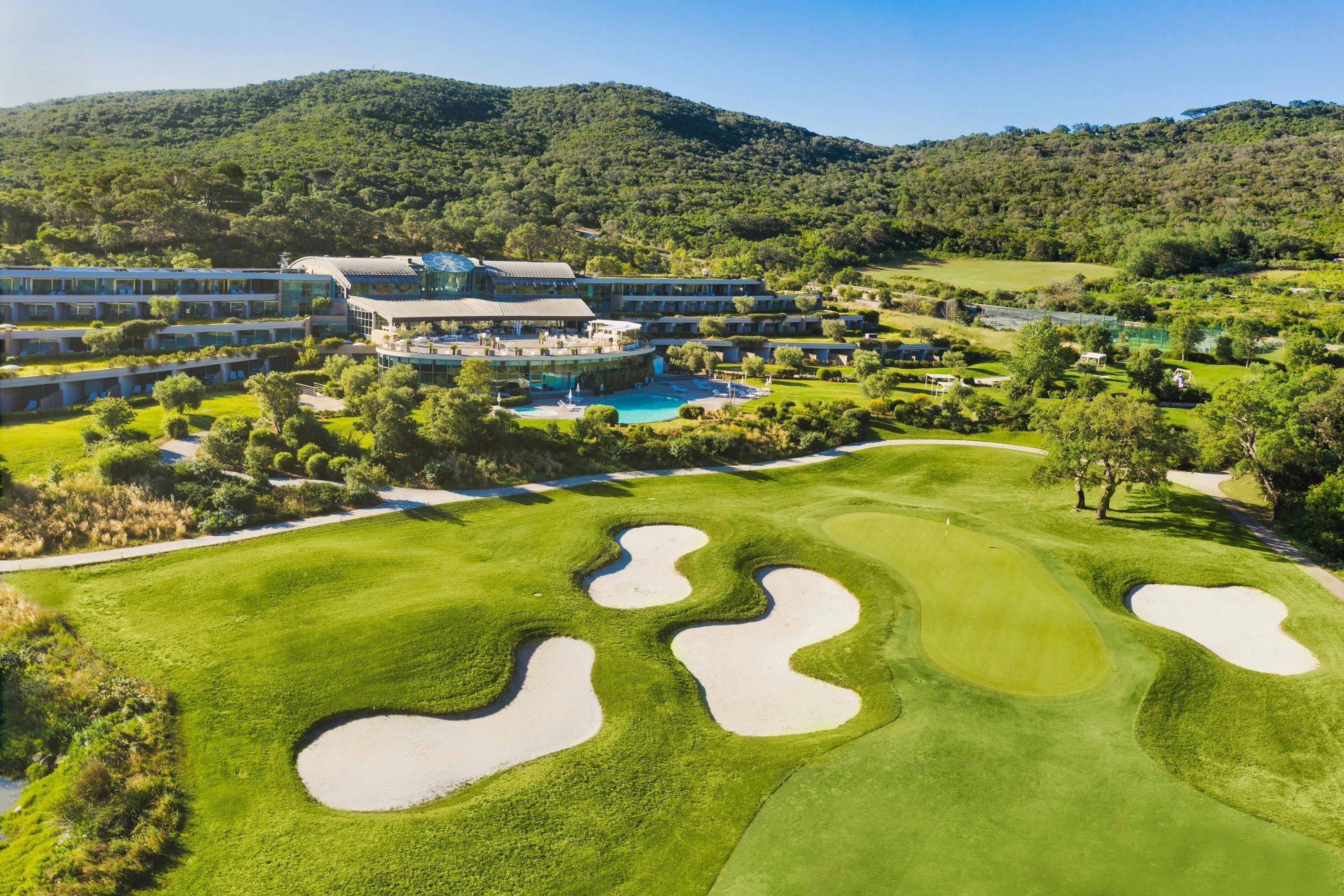 Panoramic view of the Argentario Resort Golf and Spa building overlooking the golf course