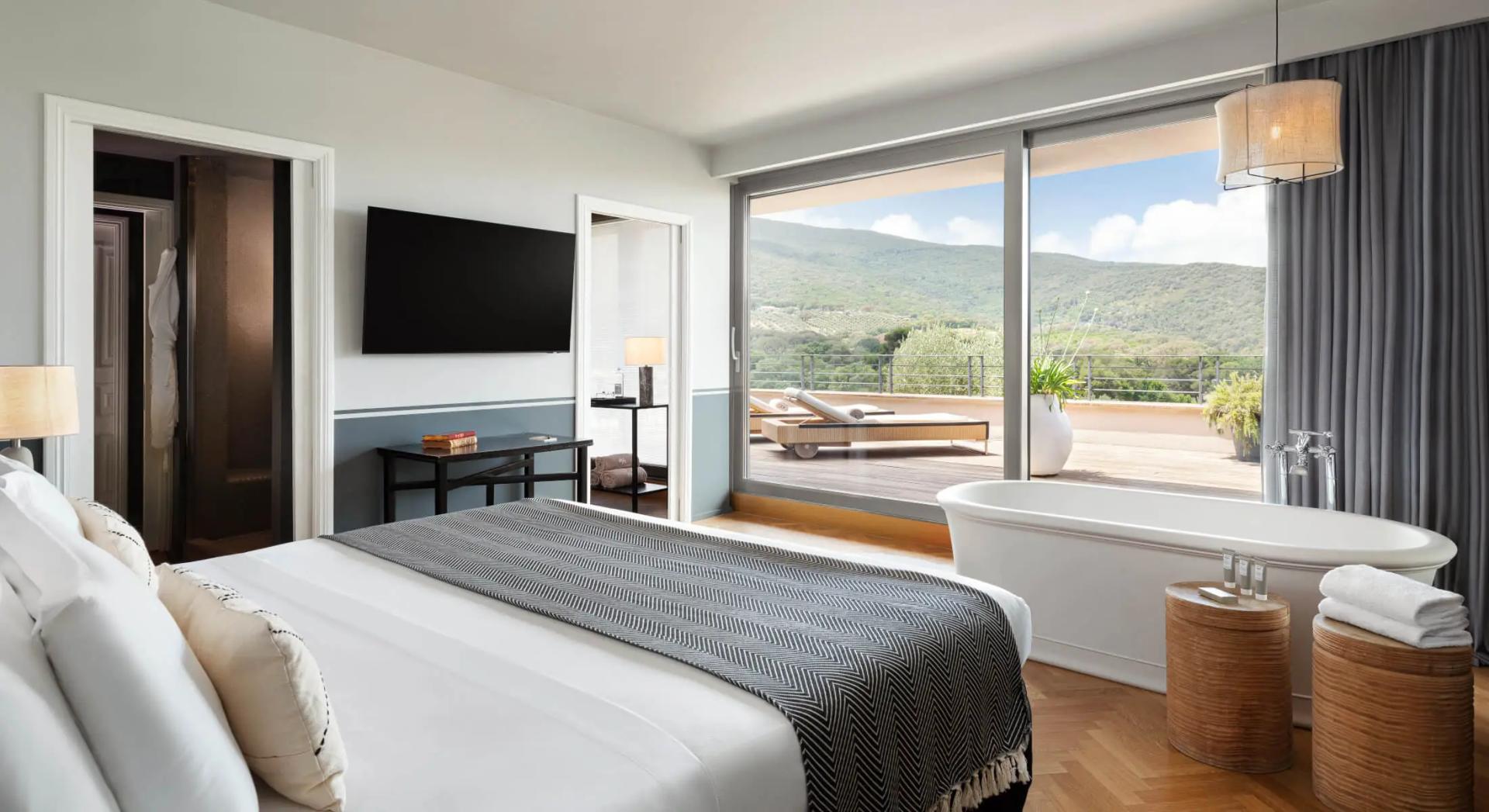 Luxurious double bed suite with a patio space