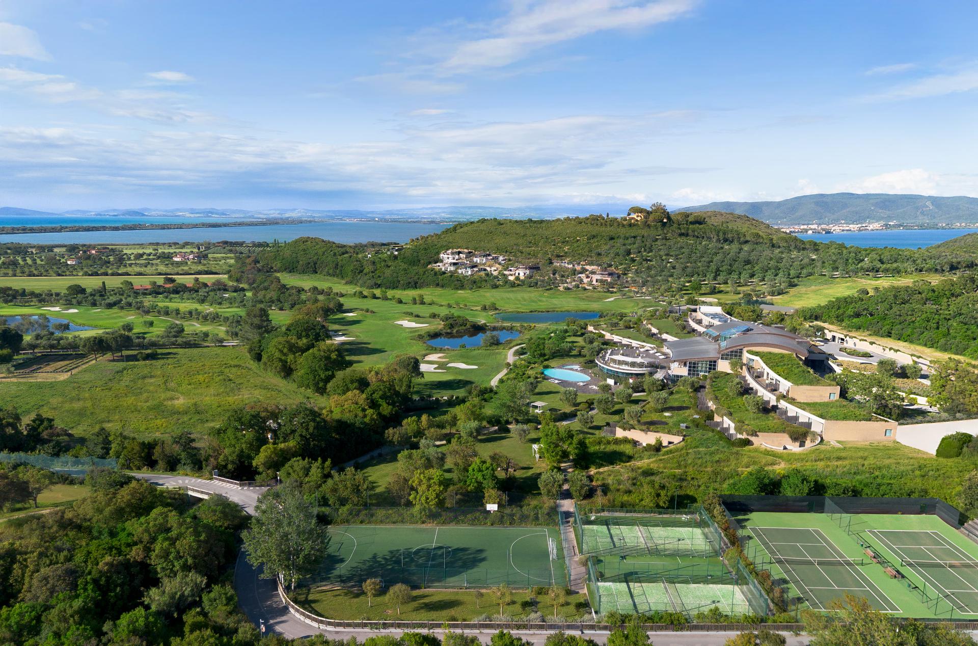 Aerial view of Argentario Resort Golf and Spa featuring tennis courts