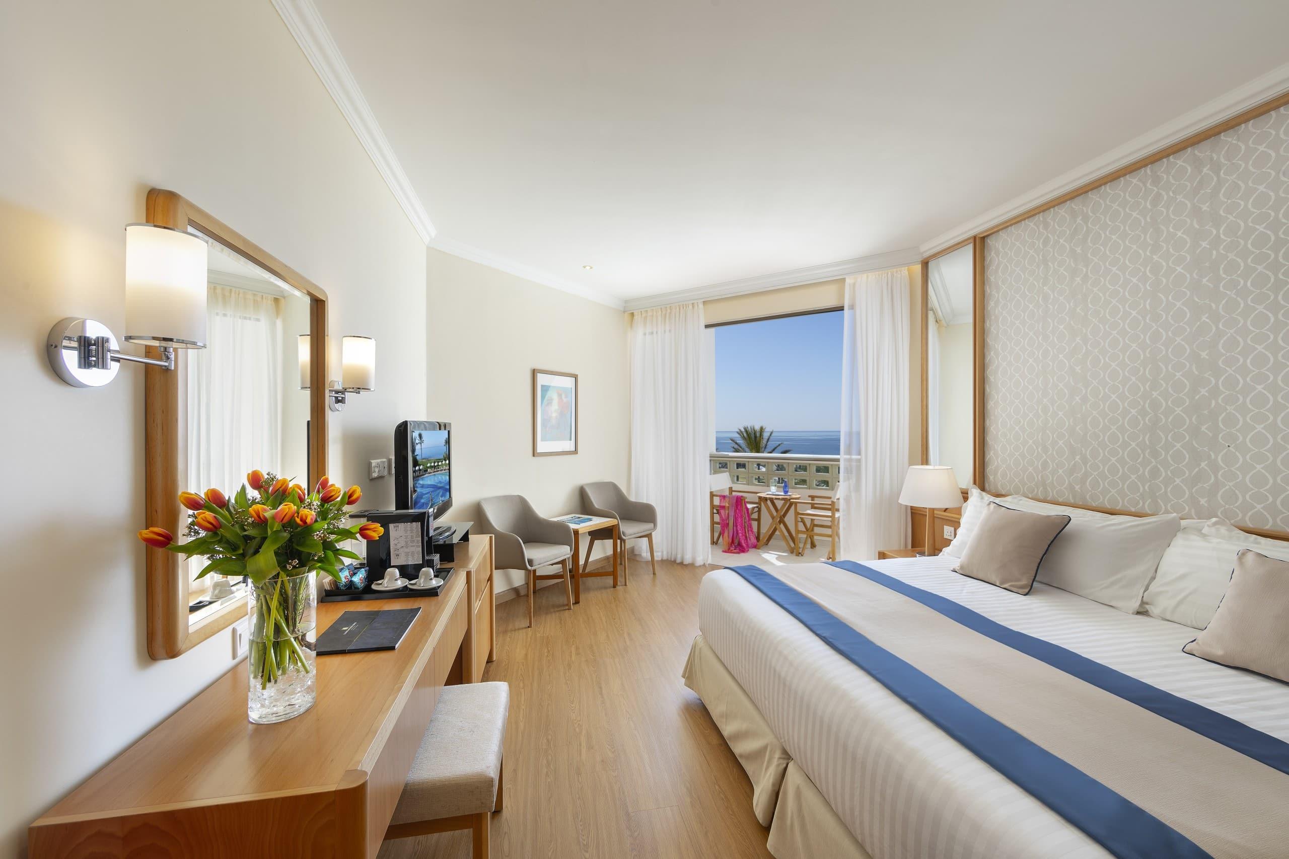 Double bed suite with balcony views at Athena Beach