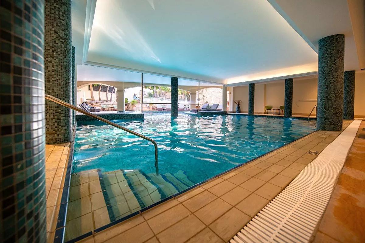 Indoor swimming pool at Atlantica Aphrodite Hills Hotel