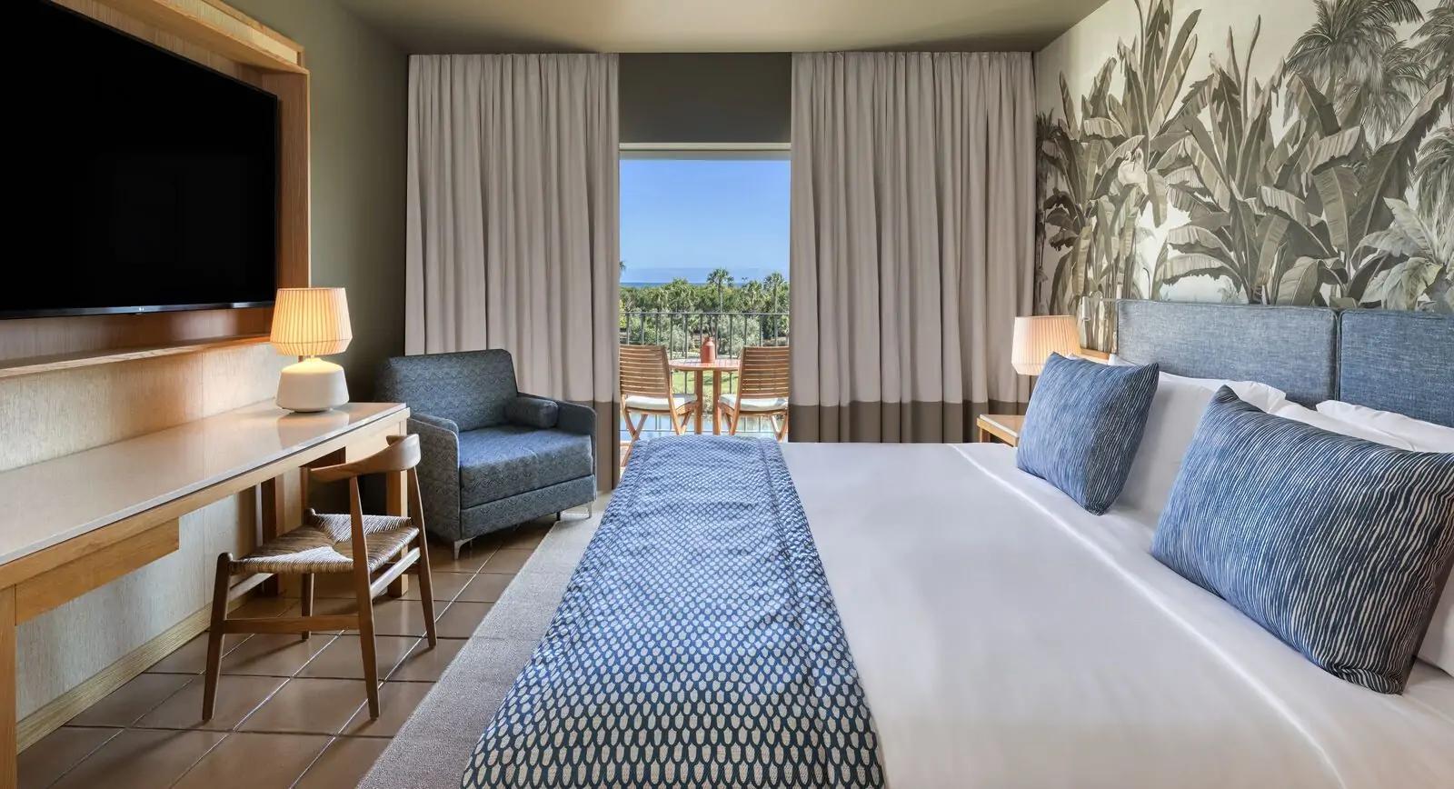 Double bed suite at Domes Lake Algarve, Autograph Collection