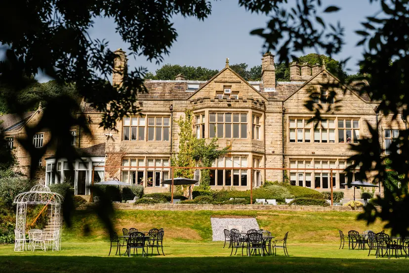 Panoramic view of Hollins Hall Hotel & Country Club through the trees