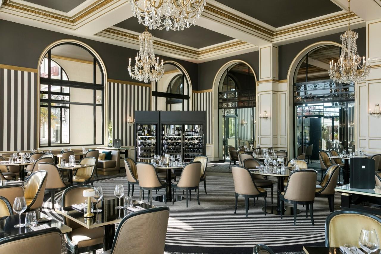 Indoor dining area at the Hotel Barriere L'Hermitage La Baule