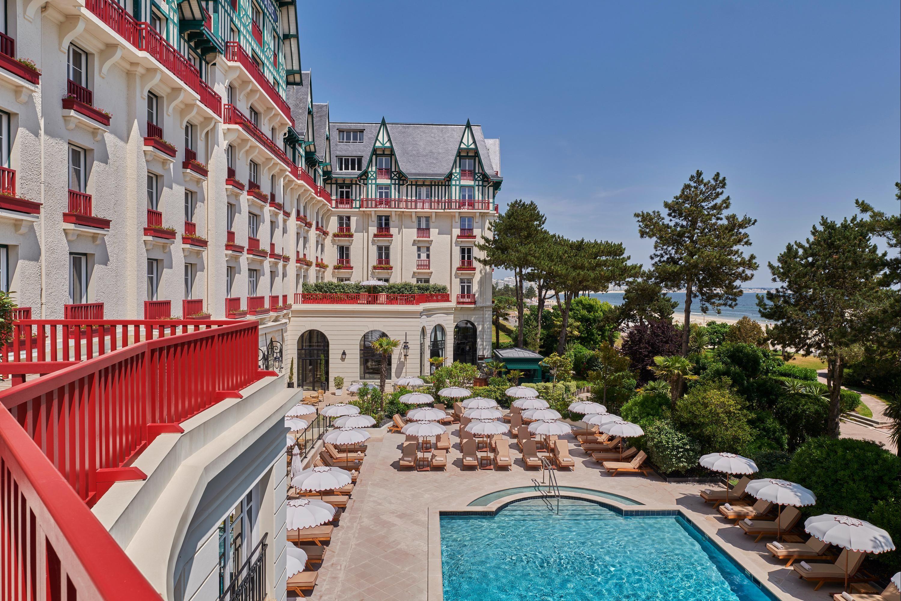 Overhead view of the outdoor swimming pool at Hotel Barriere L'Hermitage La Baule