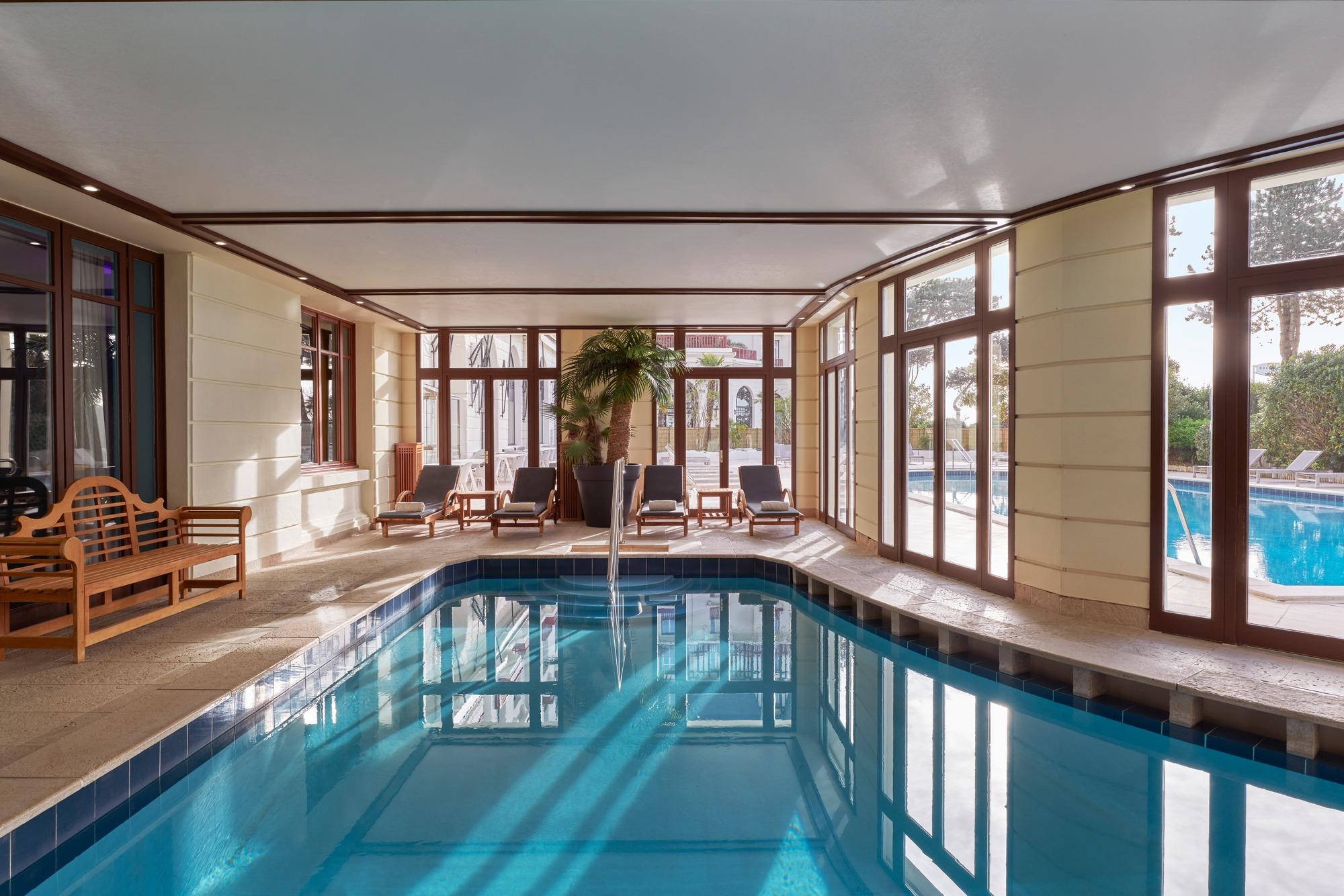 Indoor pool as part of spa facilities at Hotel Barriere L'Hermitage La Baule