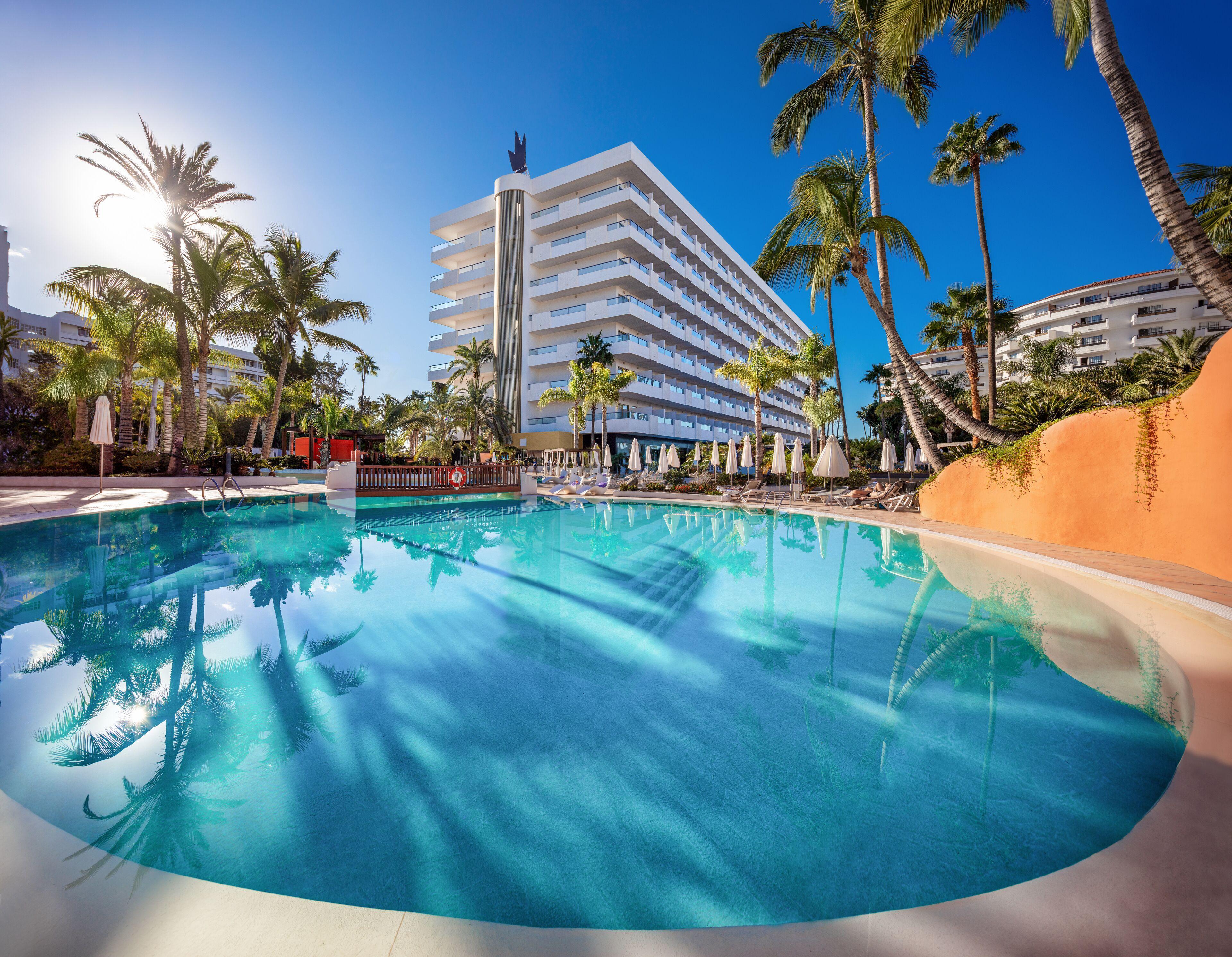Panoramic view of the Hotel Gran Canaria Princess - Adults Only building overlooking the outdoor pool
