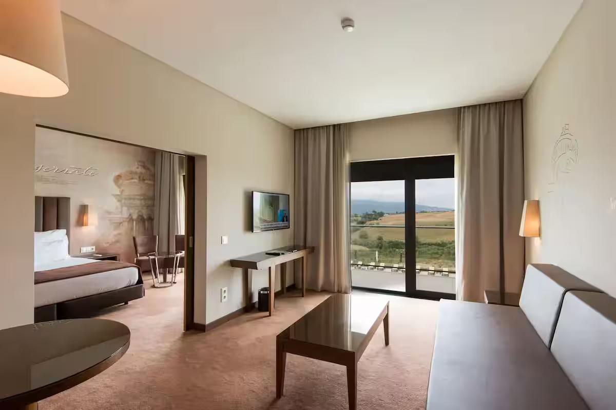 Living room as part of a spacious double bed suite at Hotel Vila Gale Collection Sintra