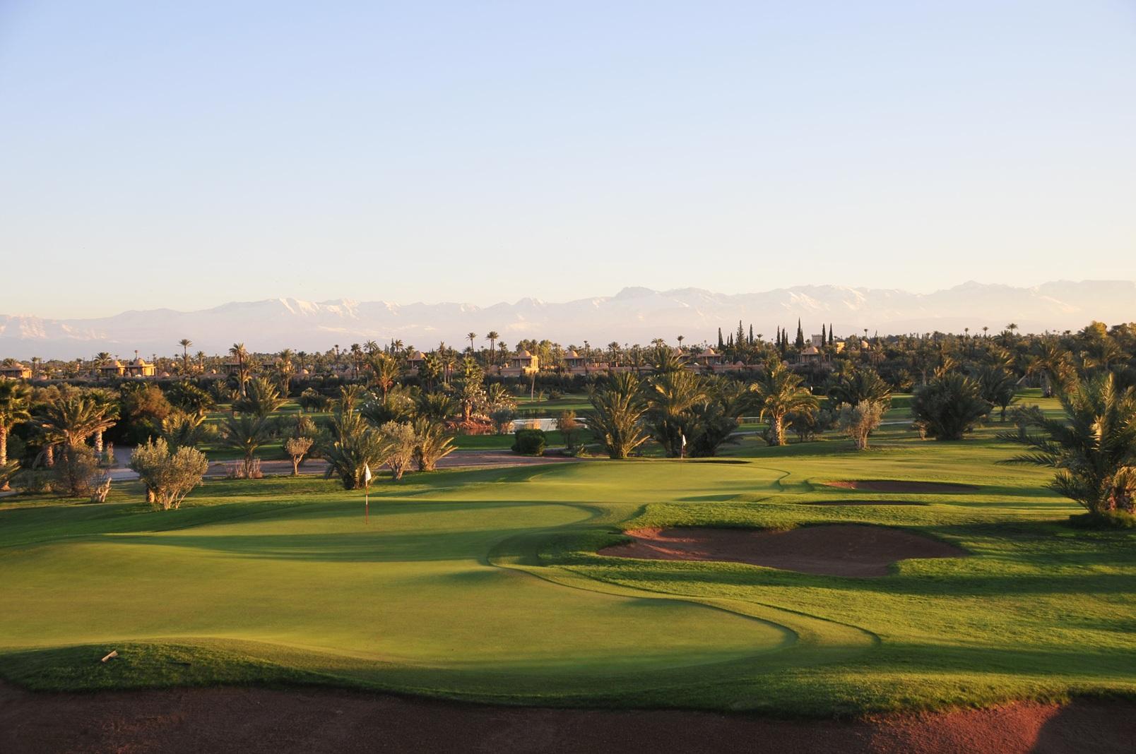 A well maintained fairway under clear skies