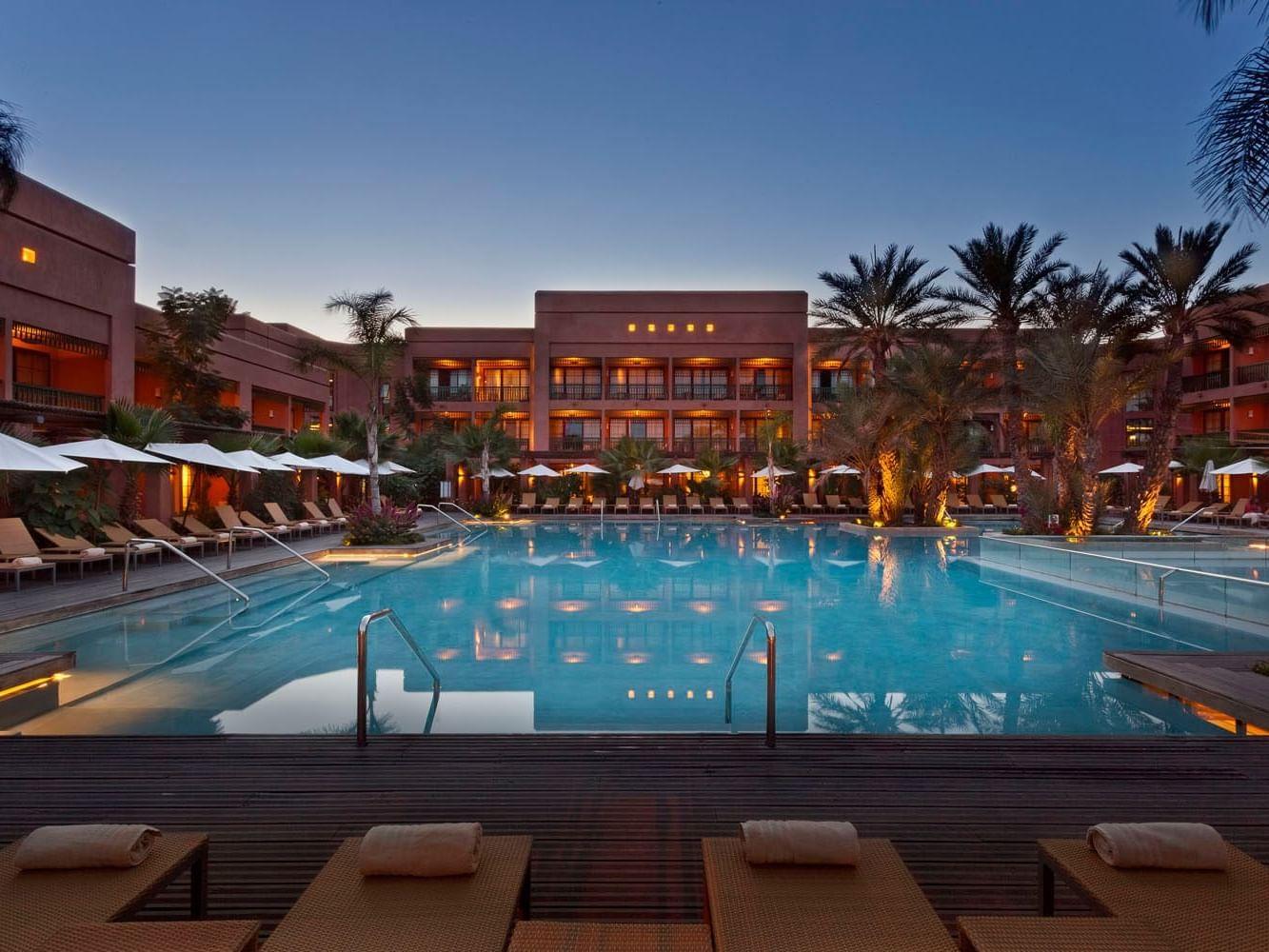 Outdoor swimming pool at Hotel du Golf by Pickalbatros