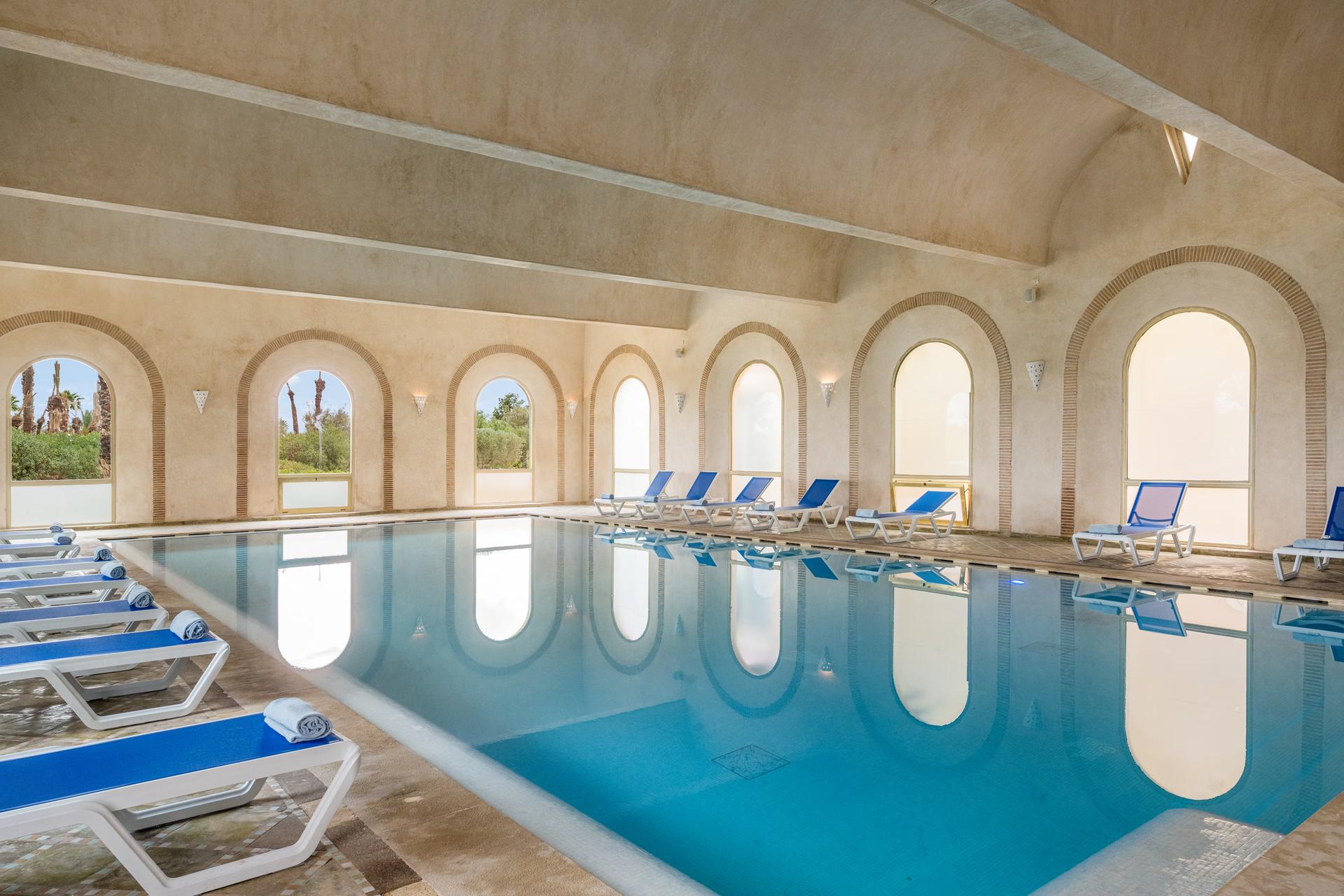 Indoor pool at Hotel du Golf by Pickalbatro