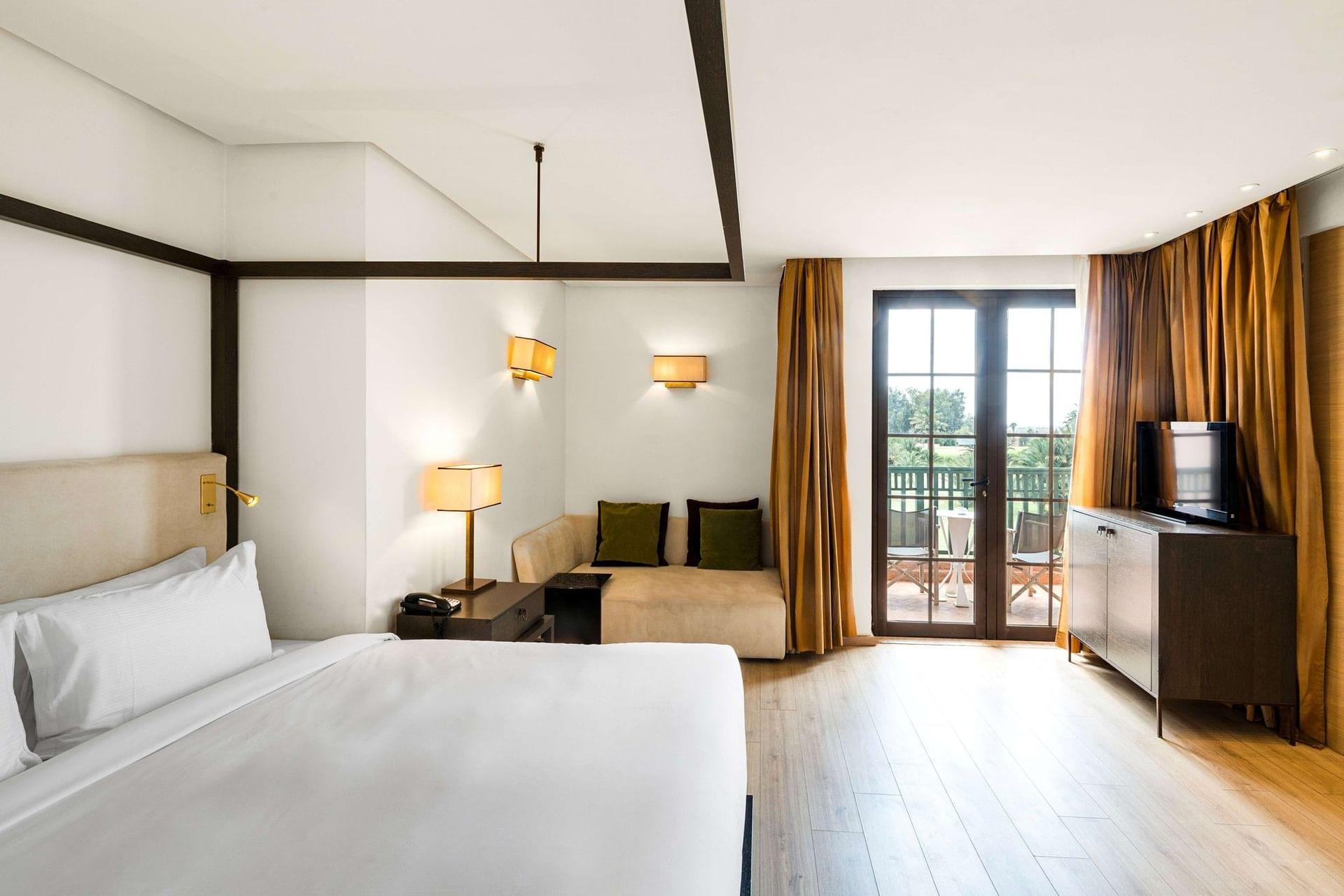 Luxurious double bed suite at Hotel du Golf by Pickalbatros