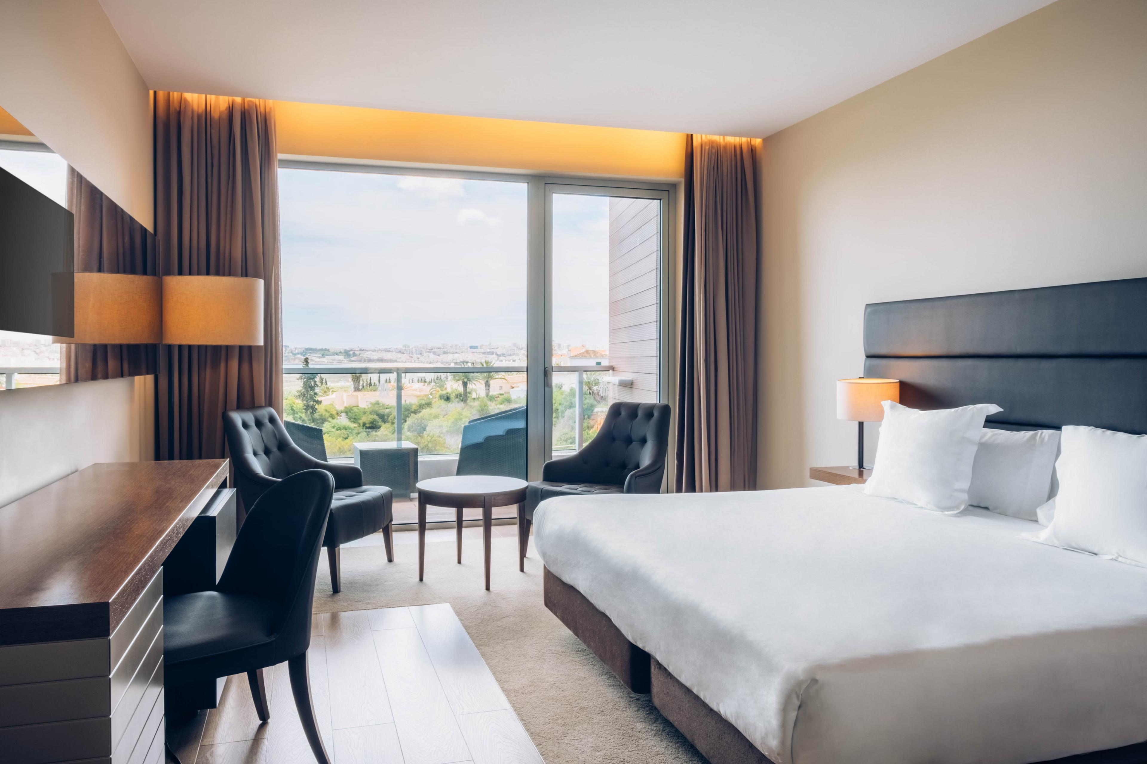 Double bed suite with balcony views at Iberostar Selection Lagos Algarve