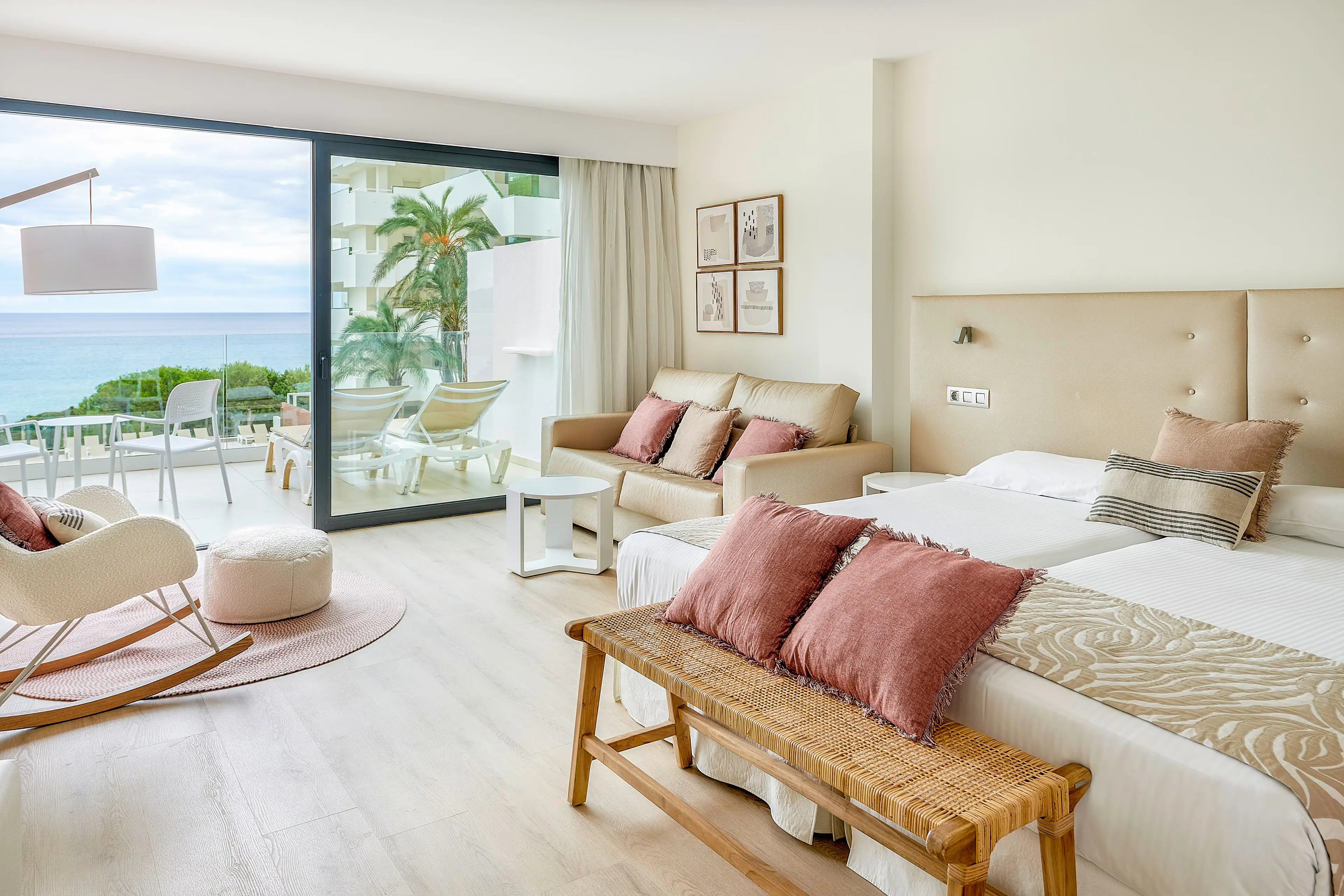 Double bed suite with balcony views of the ocean at Iberostar Waves Cala Millor