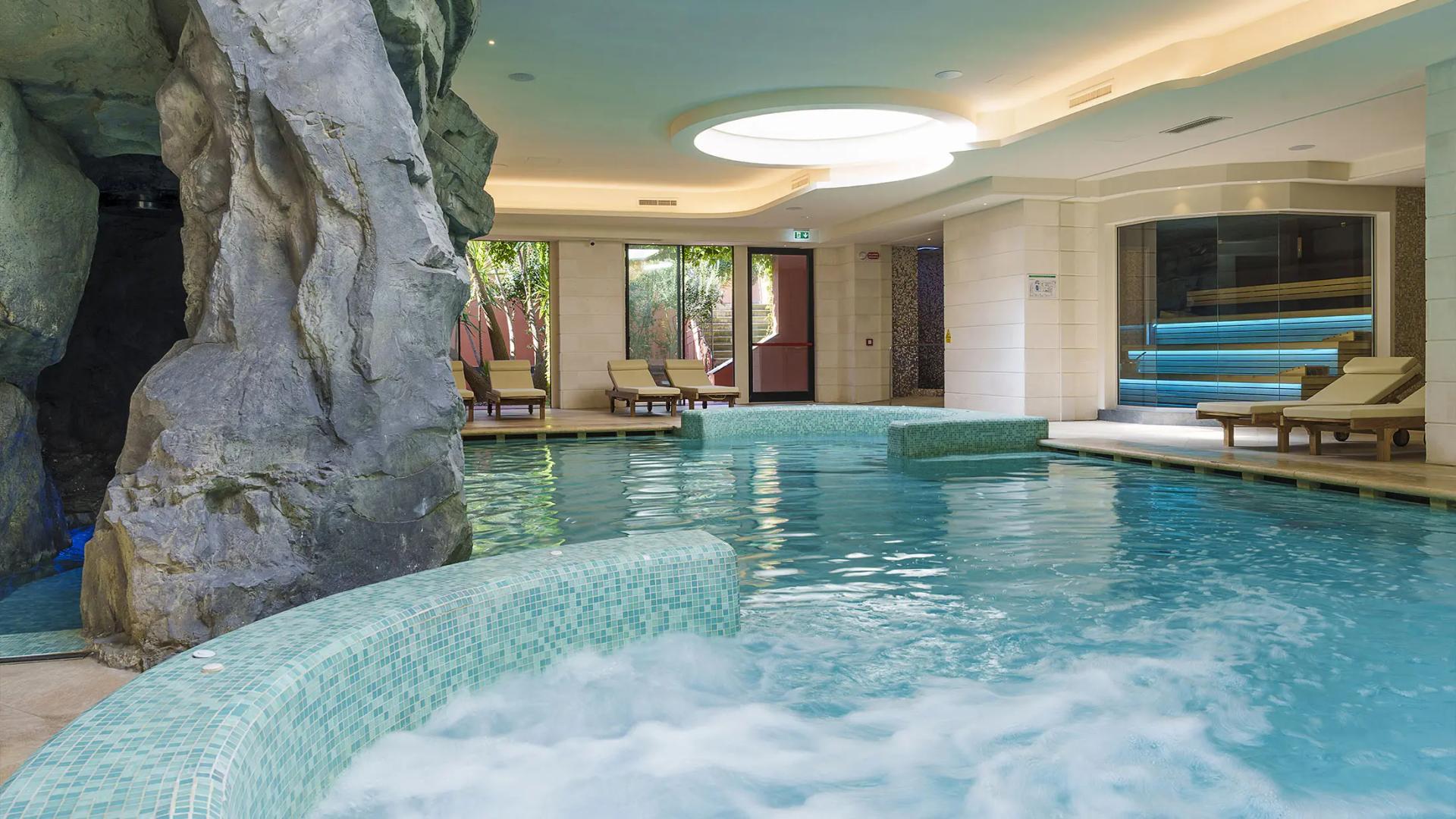 Indoor pool part of the spa facilities at Il Picciolo Etna Golf Resort & Spa, Curio Collection by Hilton
