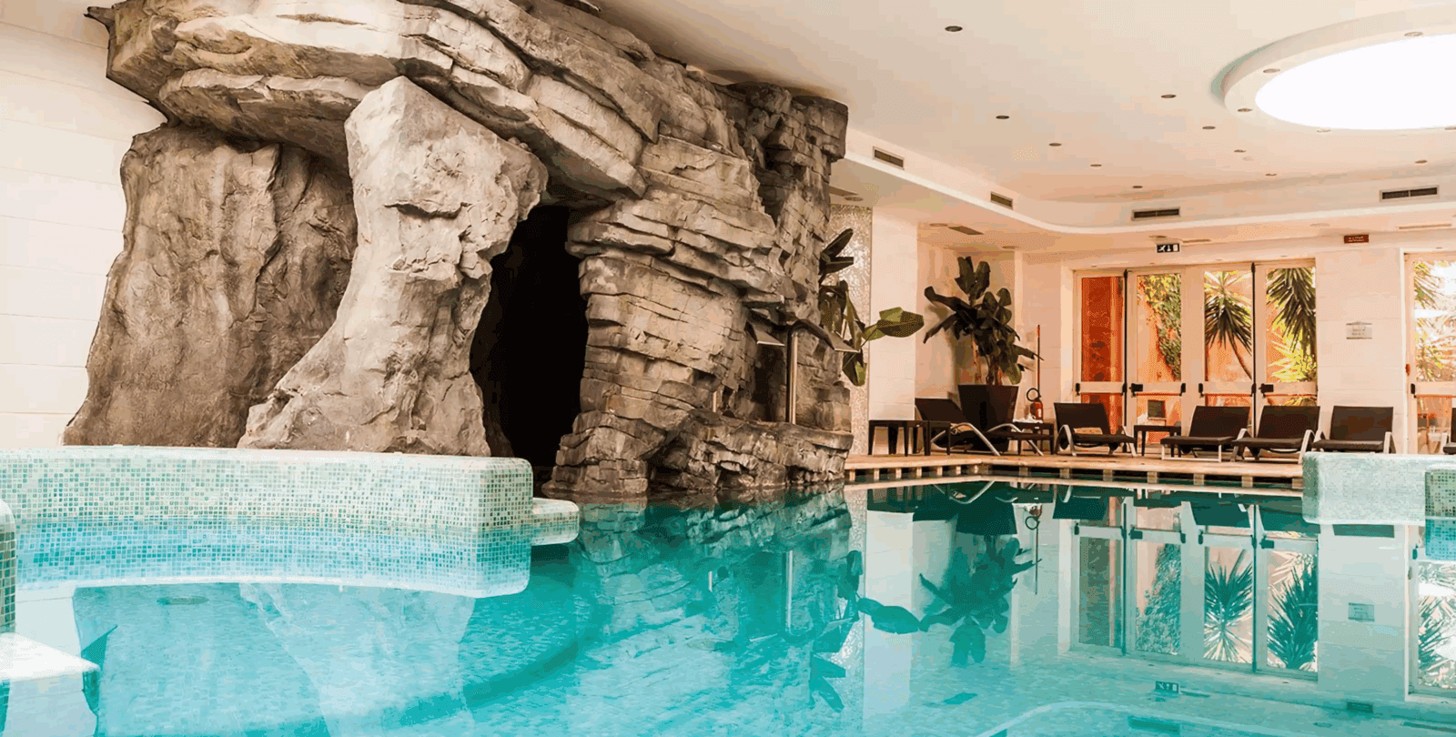 Panoramic view of the indoor pool part of the spa facilities at Il Picciolo Etna Golf Resort & Spa, Curio Collection by Hilton