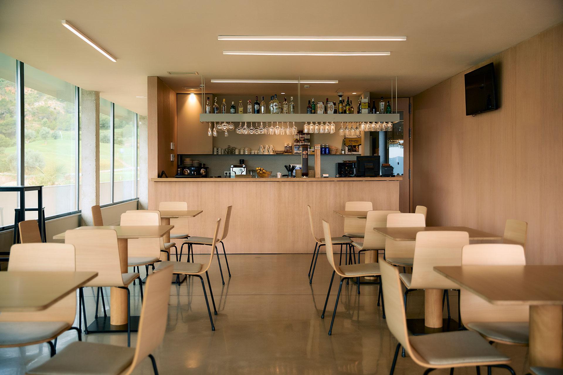 Bar with dining area at La Galiana Golf Resort