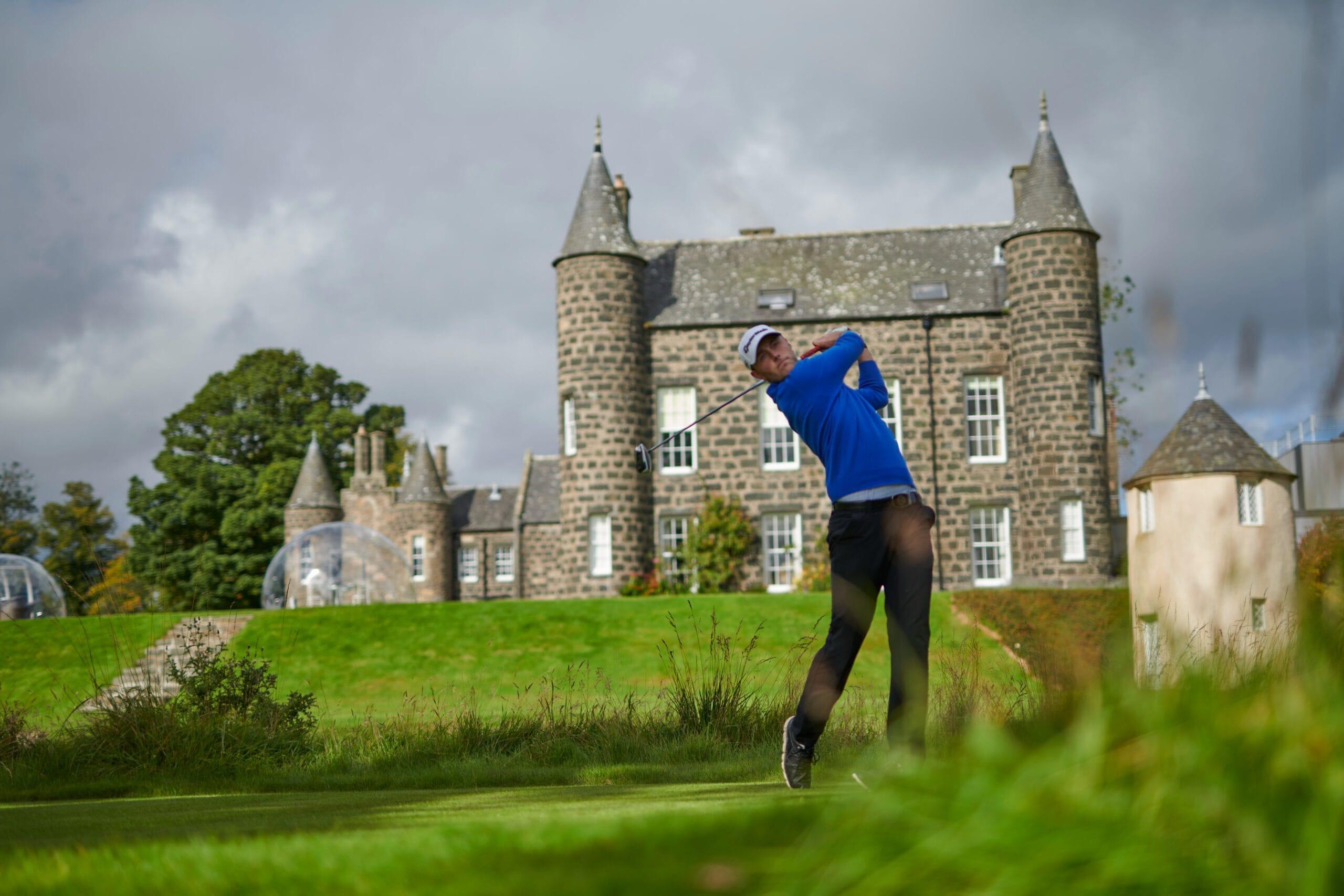 Golfer swinging on the Meldrum House Country Hotel & Golf Course