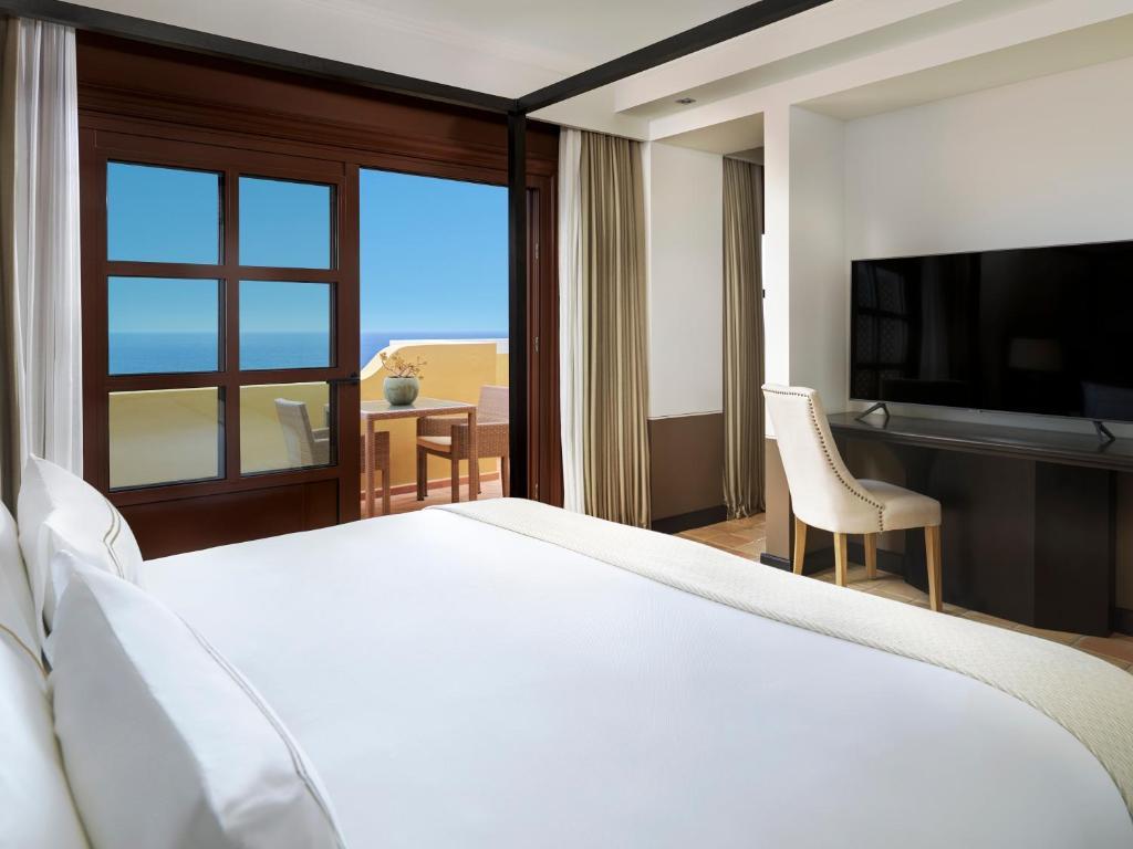 Double bed suite with balcony views at Melia Hacienda Del Conde