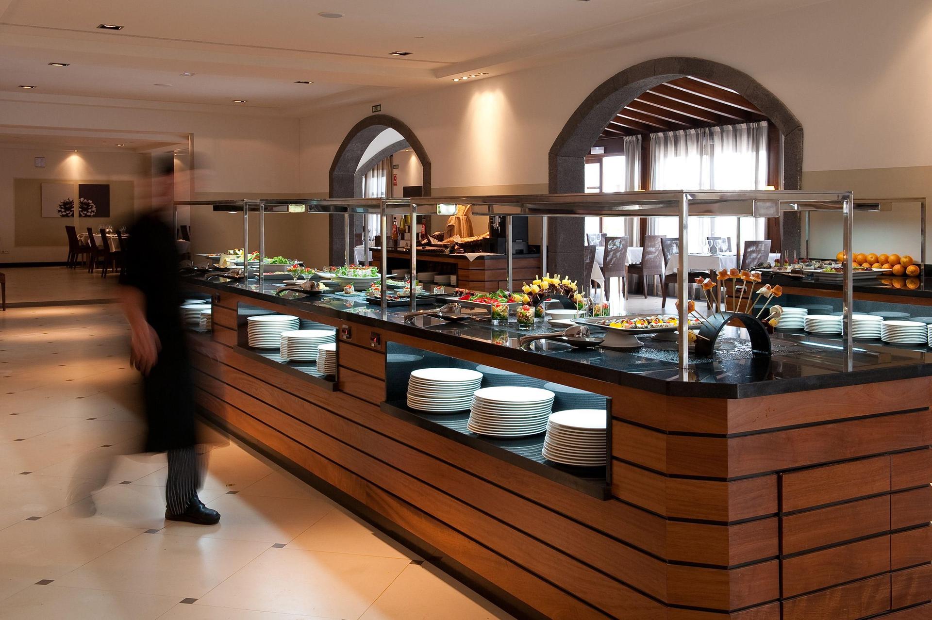 Food bar and dining room at Melia Hacienda Del Conde