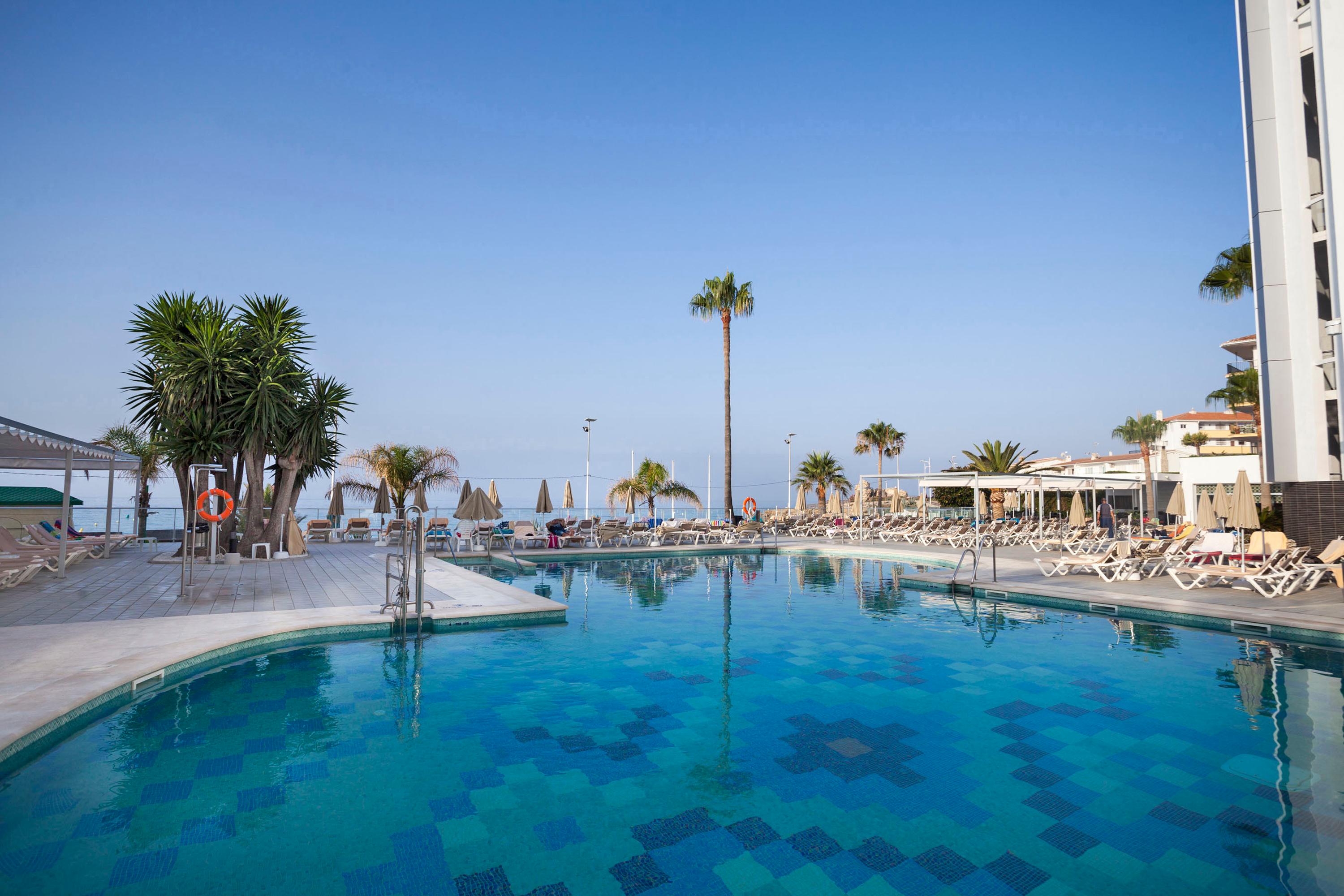 Outdoor swimming pool at Monica Hotel