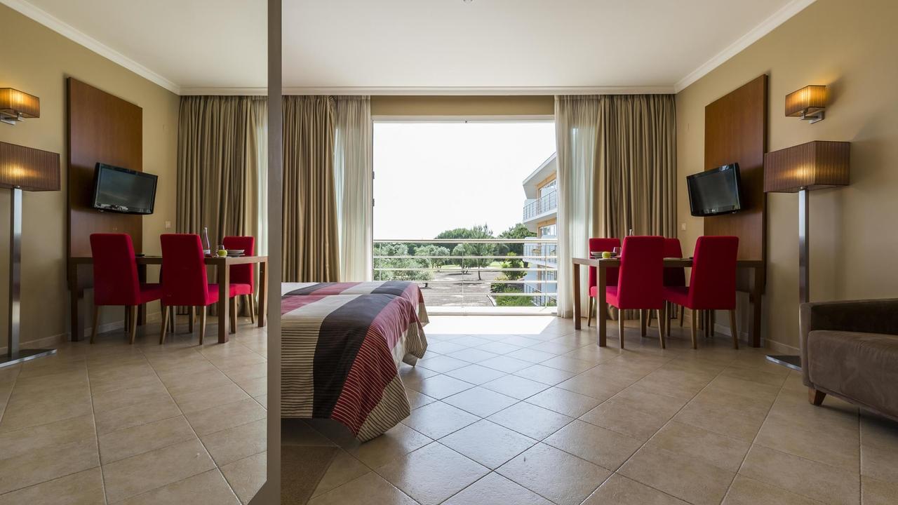 Double bed suite with balcony views at Montado Hotel & Golf Resort