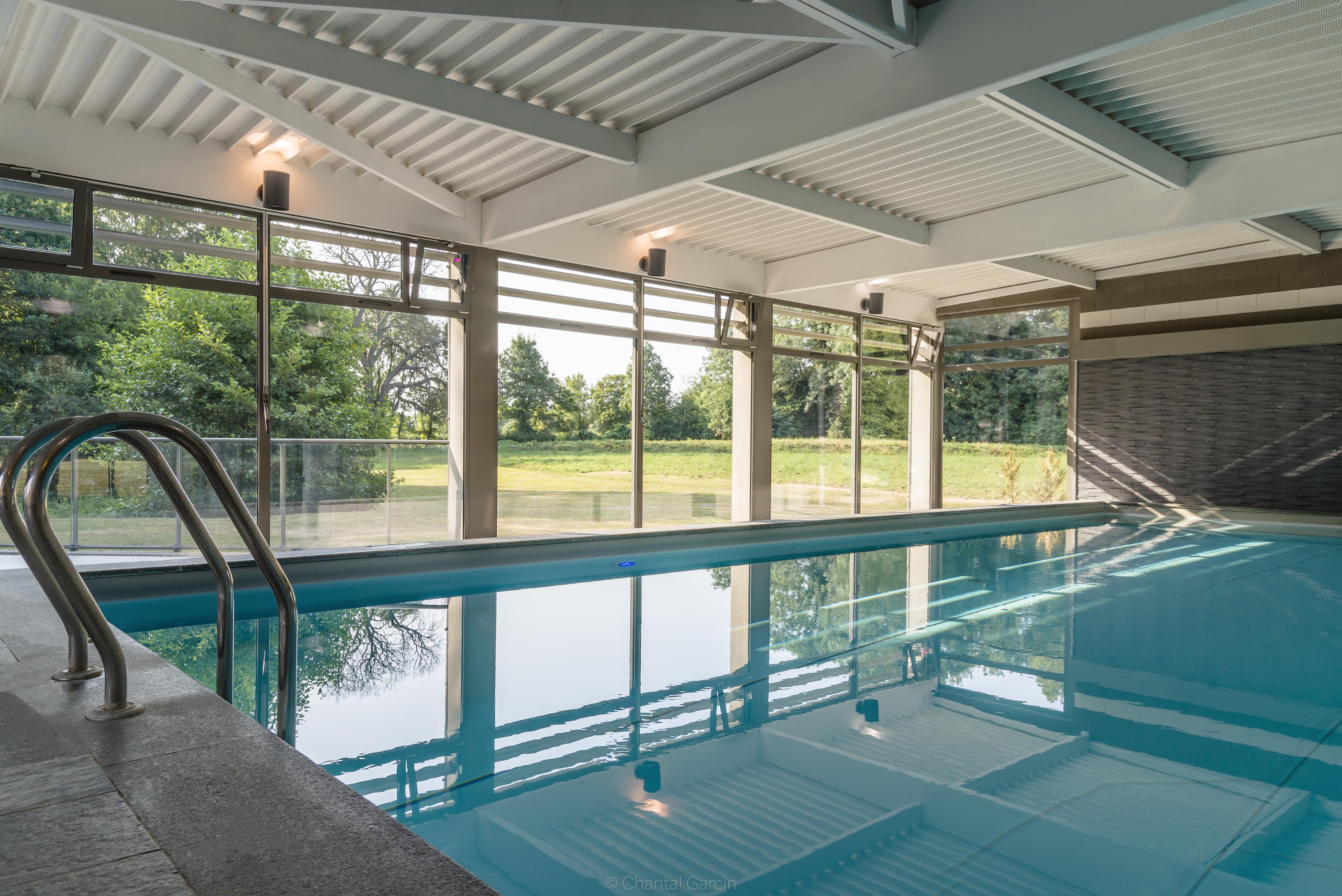 Indoor swimming pool at Najeti Chateau Tilques