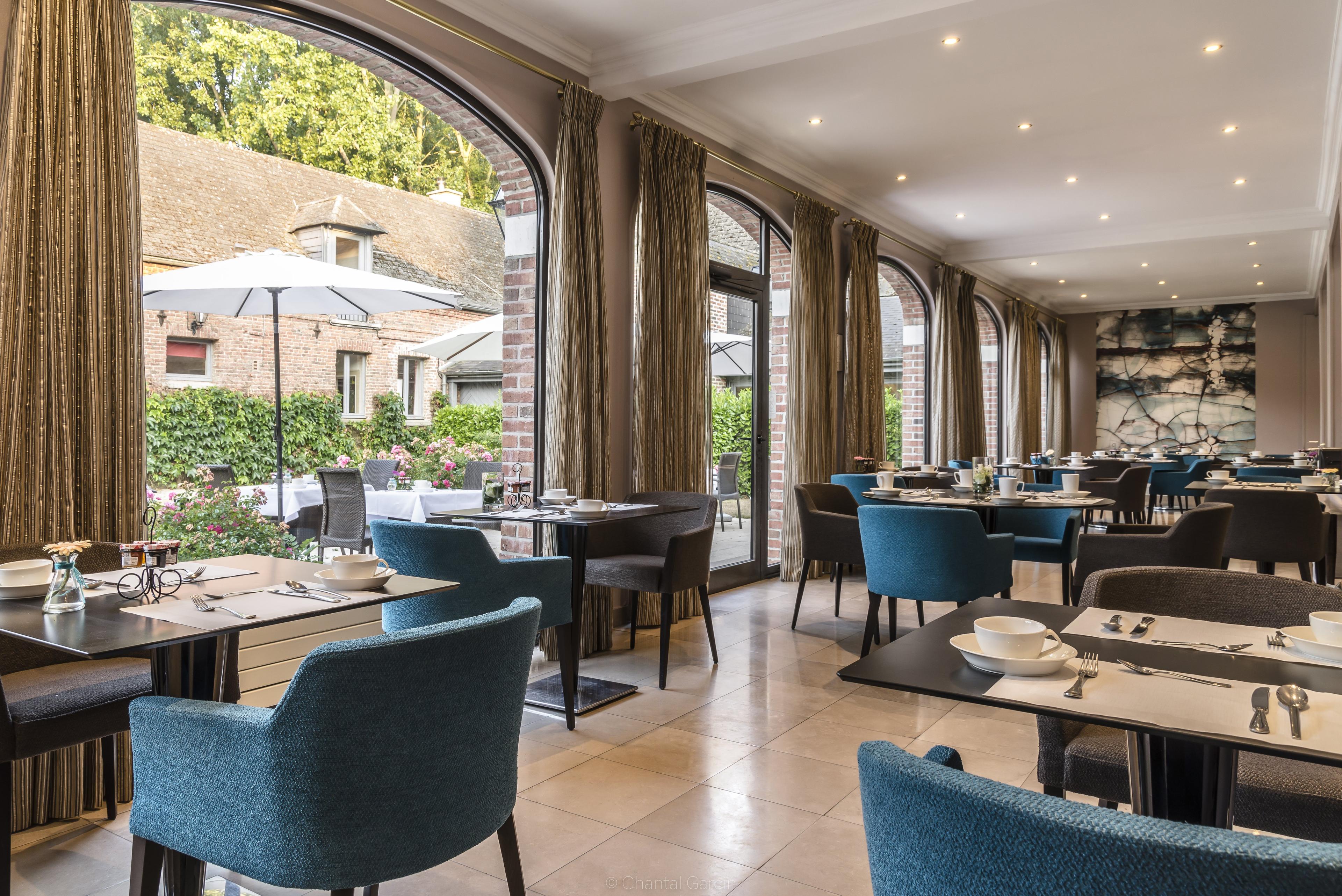 Indoor dining room at Najeti Chateau Tilques