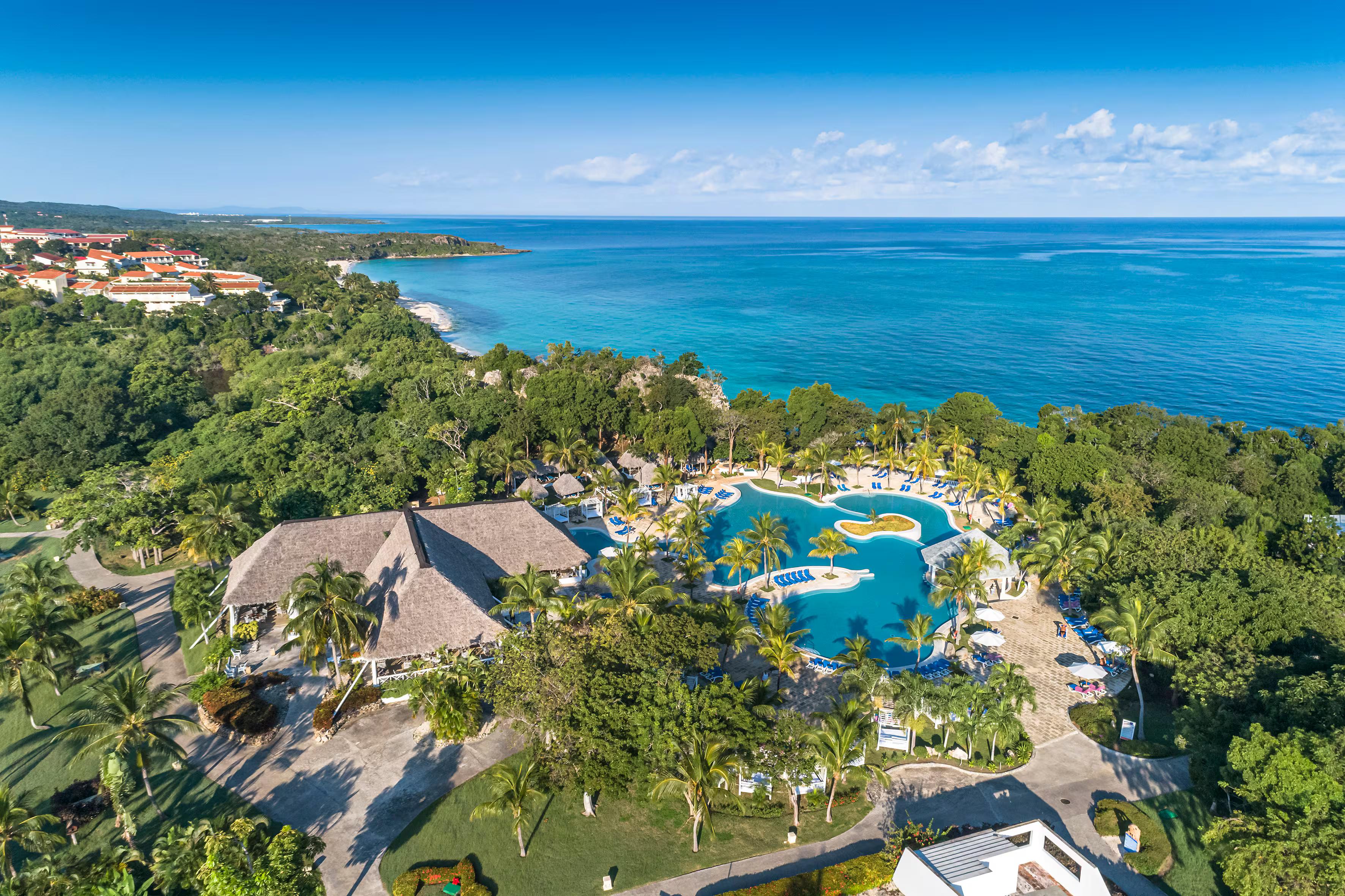 Overhead view of the outdoor swimming pool at Paradisus Rio de Oro Resort & Spa
