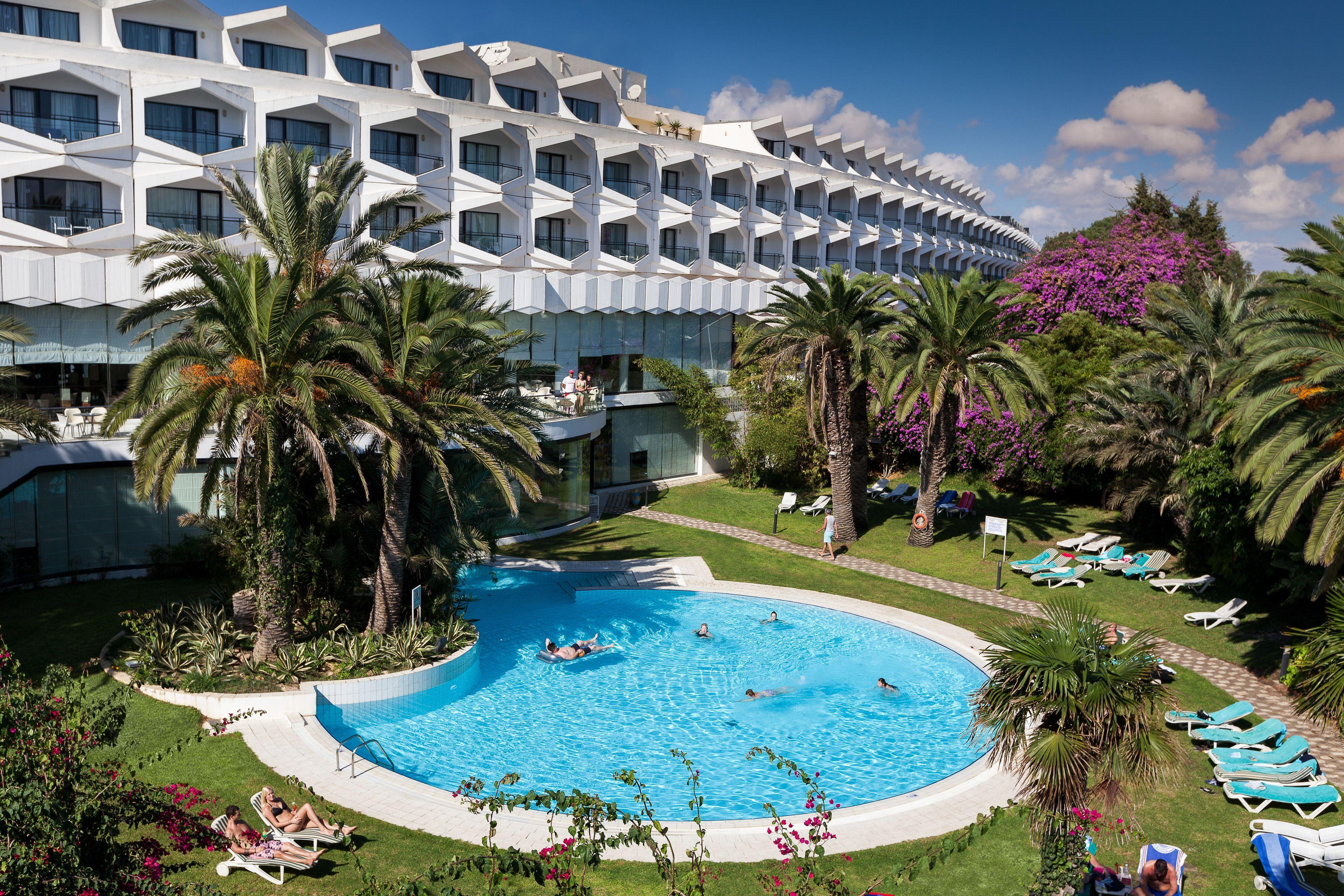 Panoramic view of the Phenicia Hotel building overlooking the outdoor pool