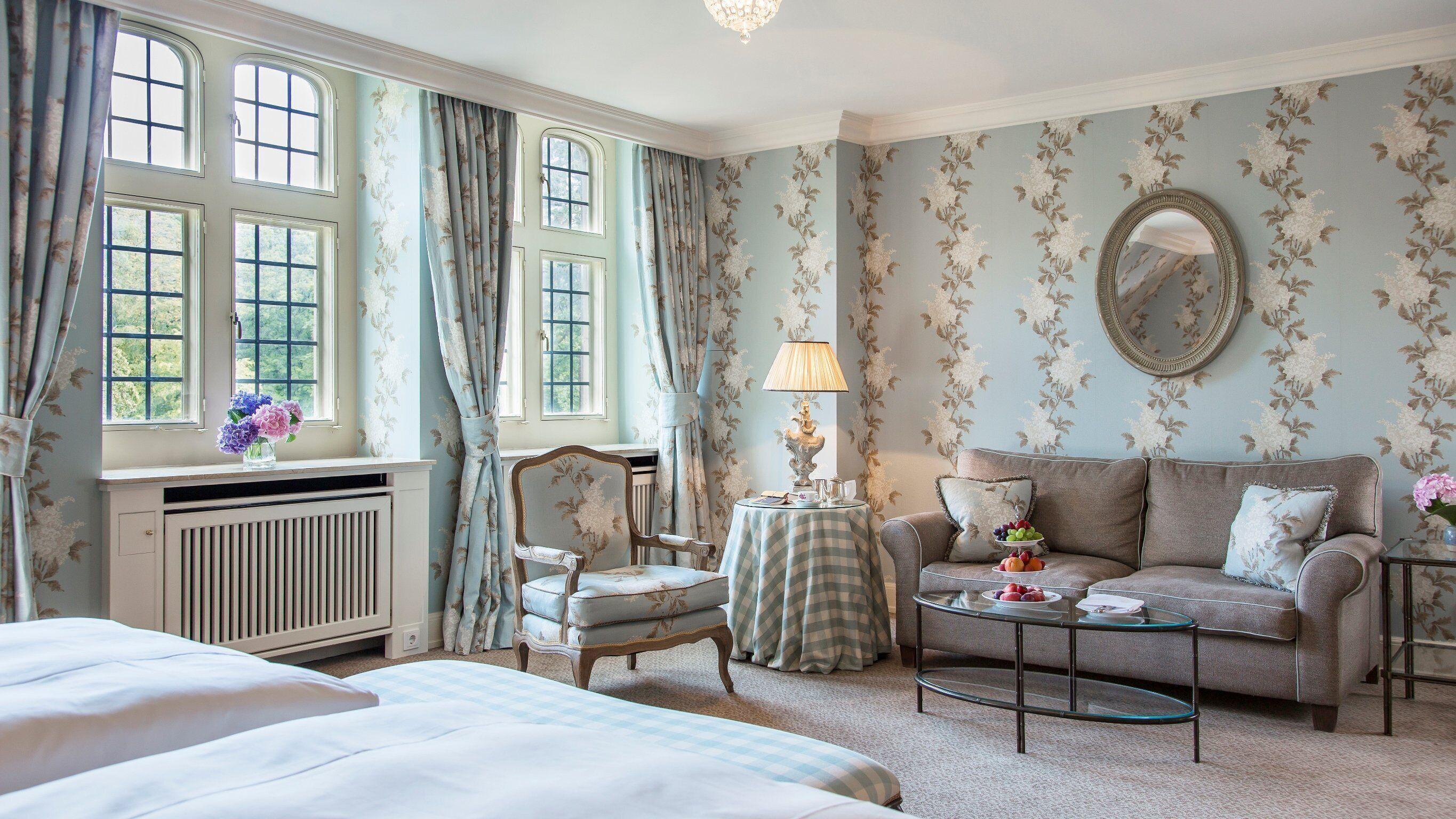 Twin bed suite at Schlosshotel Kronberg Hotel
